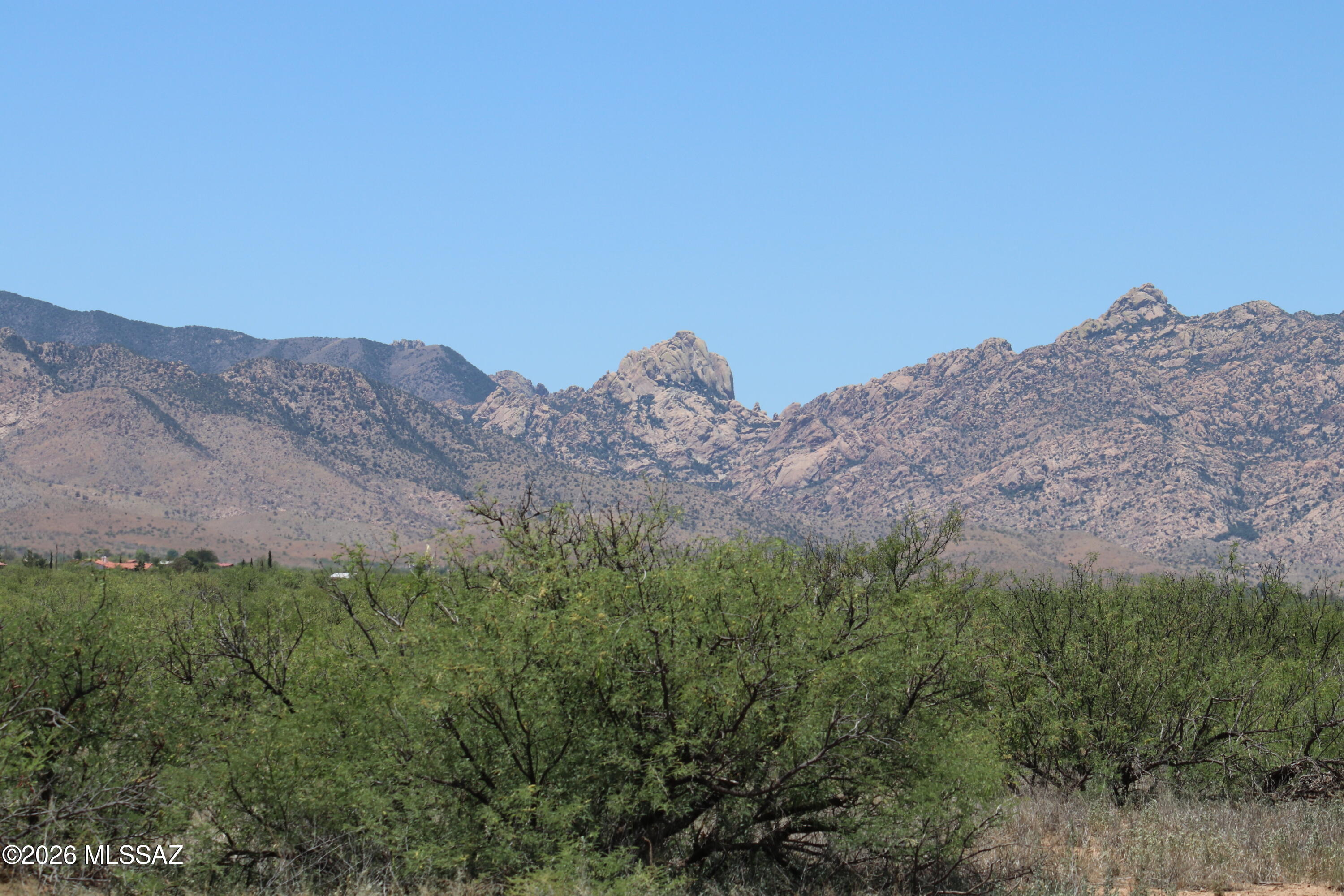 Over two acres 93,204 square feet of prime ground near Cochise Stronghold in the Dragoon Mountains of Southeast Arizona. Made up of two adjacent lots 117-02-395 & 396.  Corner lot. Electric lines 50 feet away. Zoned SR43 (Single Family site built homes on a minimum of one acre). Mild climate at approximately 4300 MSL. Good schools. Close to shopping and healthcare. Area boasts festivals and rodeos. Truly a great property to build your dream home.