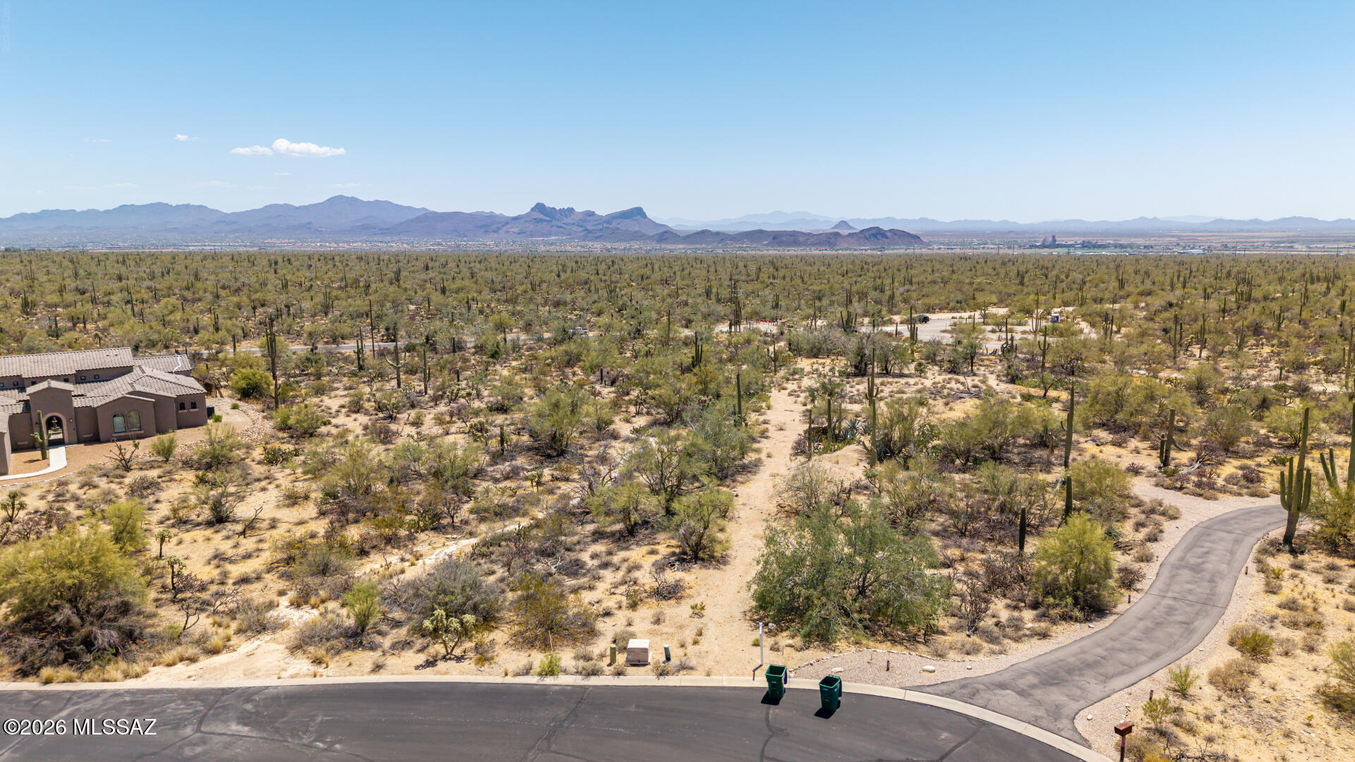 Create the custom home you've always envisioned on this exceptional 2+ acre homesite! Tucked away at the end of a quiet cul-de-sac in the gated Estates at Tortolita Preserve, an exclusive enclave in the highly desirable Dove Mountain area. Surrounded by untouched Sonoran Desert and bordering more than 2,400 acres of protected preserve land, and easy access to the AZ State Trust Land. The relatively flat terrain simplifies the building process, while utilities are already available at the lot (except septic), allowing you to focus on bringing your vision to life. Enjoy unobstructed peaceful sunsets with westward mountain views, and convenient access to hiking and biking trails, golf courses, dining, and everyday amenities. Optional concept building plans (with RV garage) included with the sale. Plenty of land for separate casita as well.