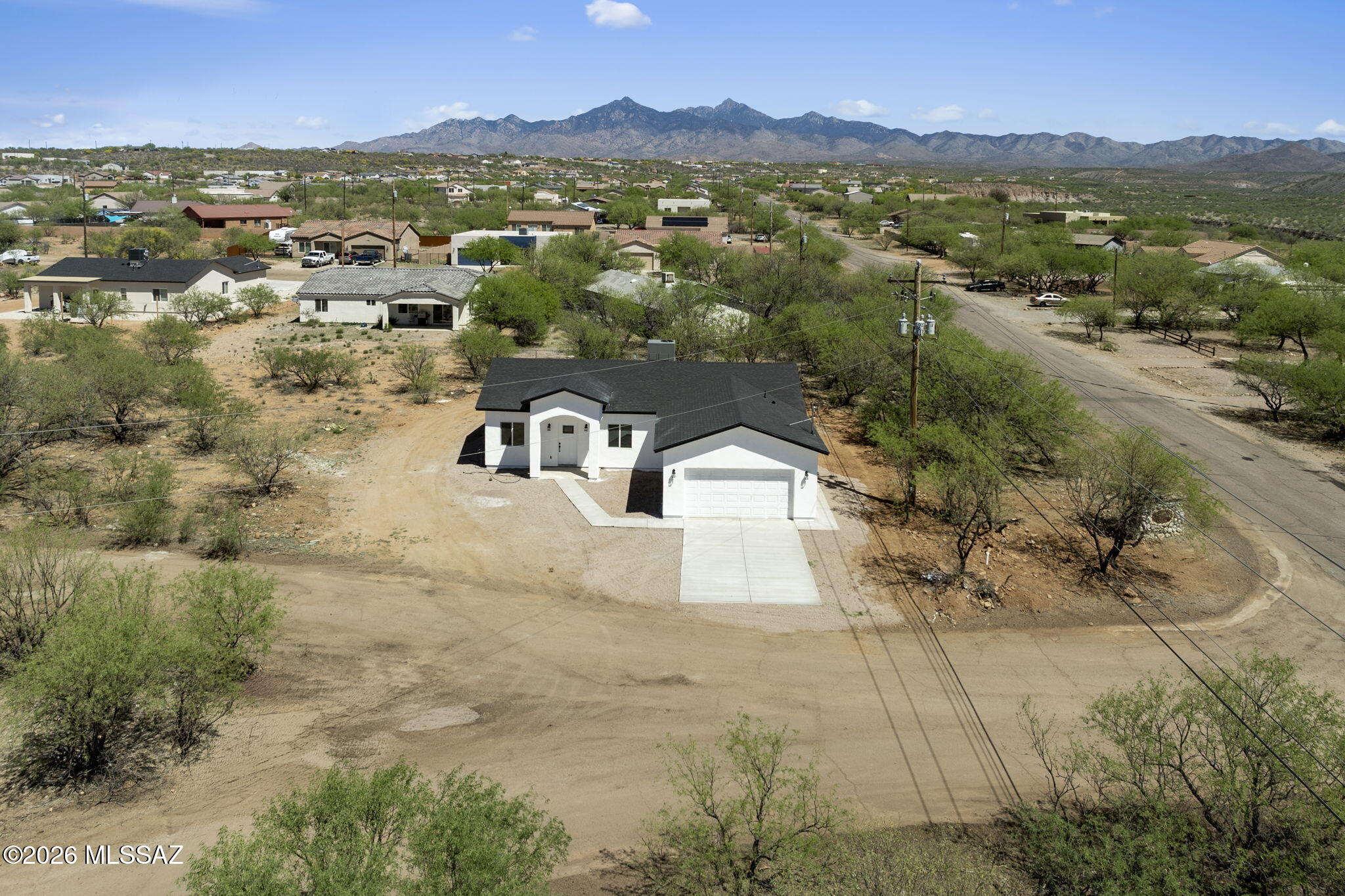 New construction 3 bed, 2 bath home in peaceful rural Rio Rico; situated on a quiet cul-de-sac. Enjoy abundant wildlife viewing and stunning night skies. Open-concept living area features kitchen island; includes 2-car garage and indoor laundry. Ready for immediate move-in.