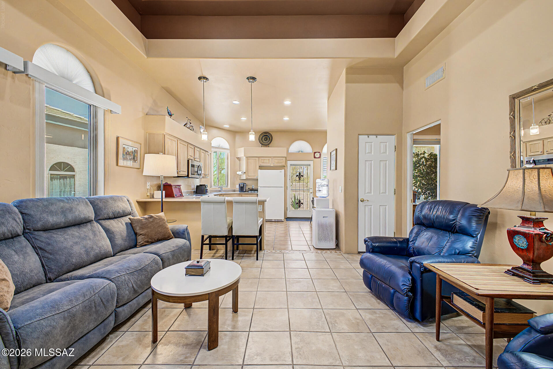 Seller will accept or counter offers between $250,000 and $267,000. 3D Matterport & Floor Plan available Call Listing Agent For Details  
Discover the joy of owning this charming single-story townhome featuring 2 bedrooms and 2 bathrooms in a desirable Community setting. Come inside to find a large great room enhanced by abundant natural light, tile flooring, and neutral palette that creates a warm, inviting atmosphere. Spotless kitchen is a cook's delight, equipped with built-in appliances, recessed/pendant lighting, plenty of cabinetry, and a breakfast bar. Airy primary bedroom offers sliding glass doors leading to the back patio and a private bathroom for added comfort. Unwind under the relaxing covered patio, or enjoy access to the amazing Community amenities such as a swimming pool.