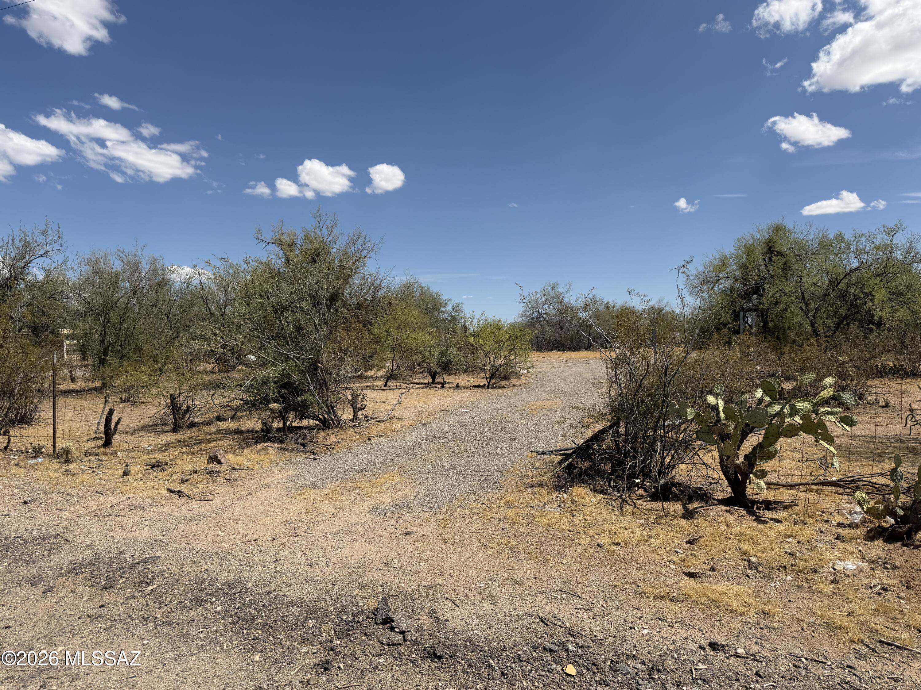 Build your Arizona dream on this spacious, ready-to-build lot in a desirable west Tucson location! This flat parcel offers paved road access with water and electricity conveniently available making it an excellent opportunity for your custom home or next investment. Enjoy breathtaking desert scenery, mountain views and easy access to Saguaro National Park West, where miles of hiking, biking, and wildlife await just minutes from your doorstep. Experience peaceful Sonoran Desert living while remaining close to shopping, dining, schools, and downtown Tucson. Don't miss this rare opportunity to own a prime homesite in one of Tucson's most scenic locations!