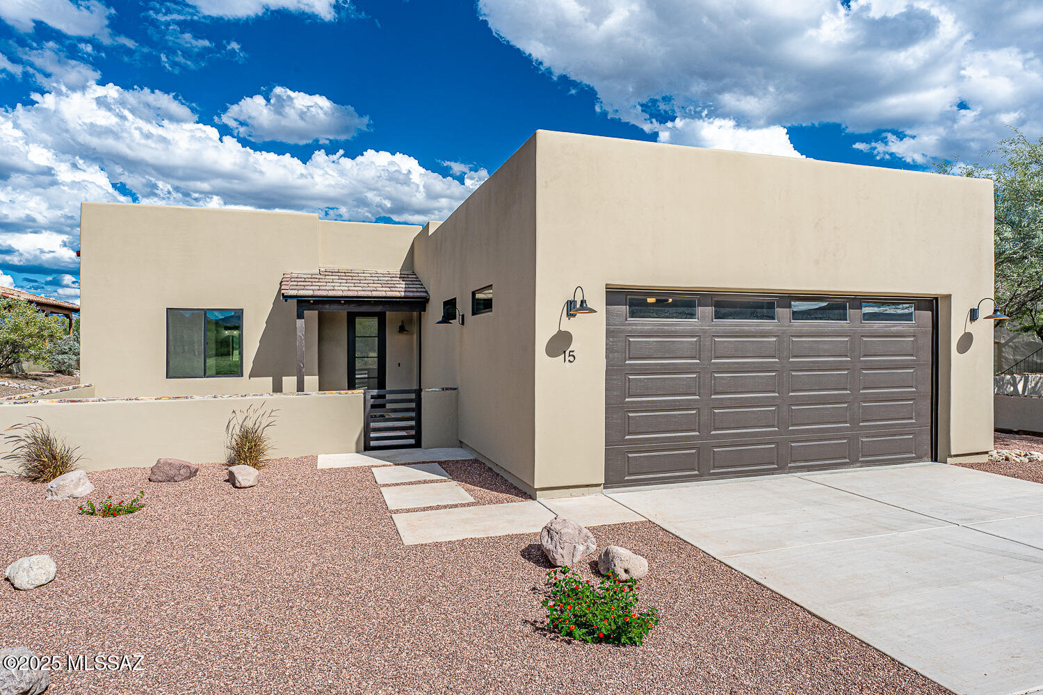 Luxury Tubac Az + New Build with Casita + Mountain Views +Golf Community. This  ''Luna'' showcases refined Southwest living surrounded by sweeping desert landscapes & endless blue skies. home featuring a private casita and stunning mountain views. A welcoming courtyard leads to an open-concept layout with high ceilings, porcelain floors, and a chef's kitchen with quartz island and premium finishes. Enjoy seamless indoor-outdoor living on the covered patio--perfect for sunset entertaining. The detached casita offers flexibility for guests, a home office, or rental potential.
Located near Tubac Golf Resort, art galleries, and dining, this is ideal as a full-time home or lock-and-leave retreat.
Rare new construction with casita--move-in ready and priced to sell. Schedule your showing today.