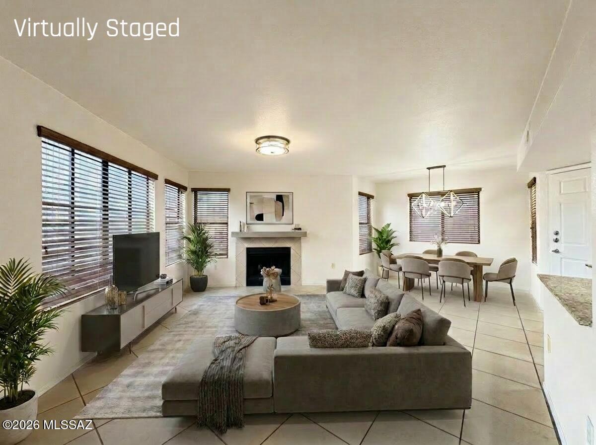 This is the home you've been waiting for! Located in top-rated District #16, enjoy luxury desert living at this floor level condo nestled in the lovely Villas at Sabino Canyon. Walk into the spacious living room, complete with natural light, tile floors and fireplace, perfect for those cool winter nights. Gorgeous kitchen is complete with granite counter tops, cherrywood cabinetry, plus all stainless steel appliances! The gated community offers resort-style facilities including pristine swimming pool, spa and fitness center! Not to mention all that Sabino Canyon has to offer, such as shopping, famous hiking spots and more! Look no further as the beautiful desert landscape surrounds you, and you'll breathe a sigh of relief for finally finding home.