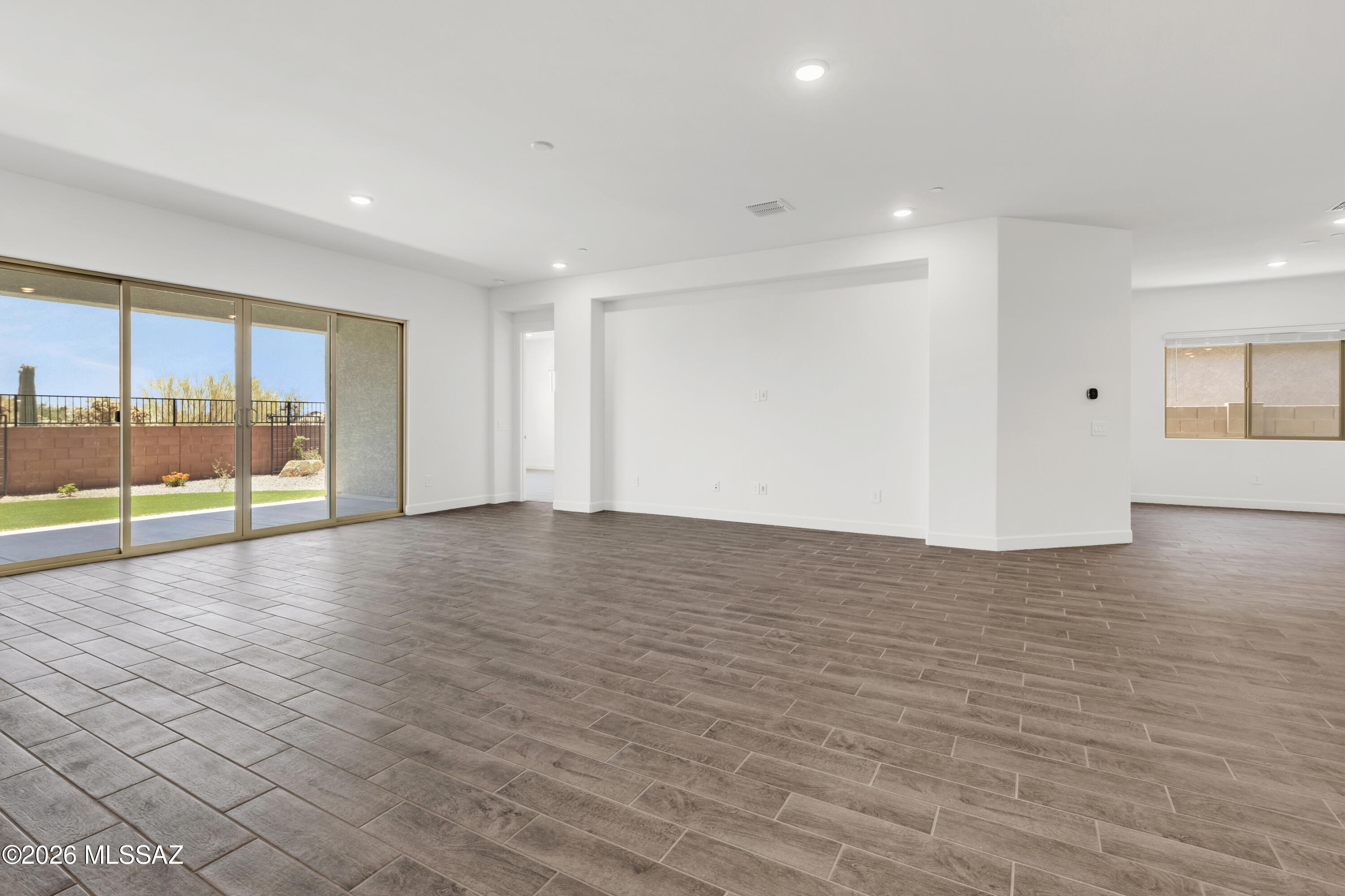 Discover the Hibiscus plan with its stylish Spanish elevation, offering 4 bedrooms, 3.5 baths. Beautiful kitchen shines with granite counters, a center island, gas range, and walk-in pantry. The enclosed study, open den, and Stop & Drop area add everyday convenience. Includes Washer/Dryer and fax wood blinds. A 3-car tandem garage completes this thoughtfully designed home. Backyard landscaping to be added.