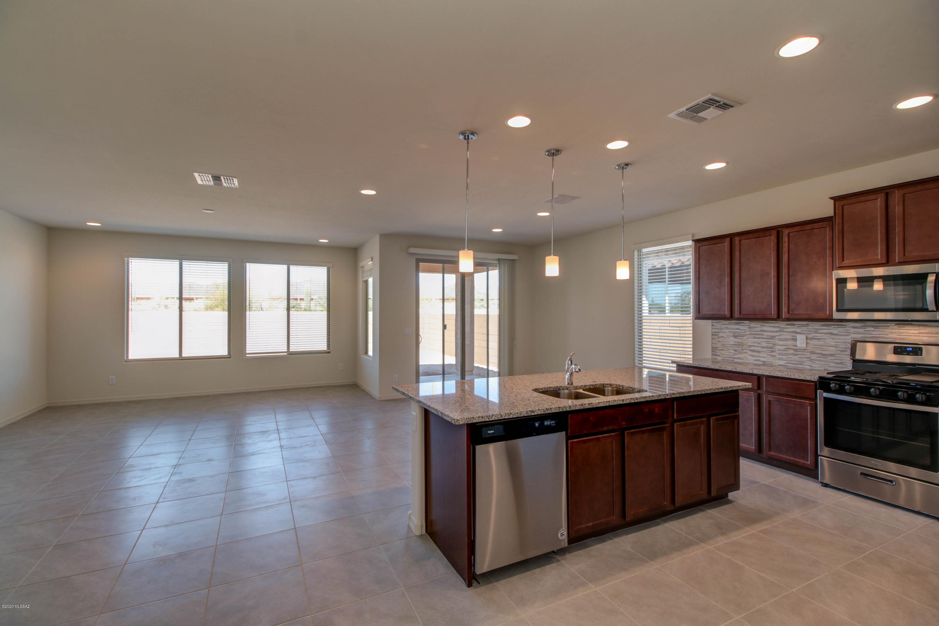 Gorgeous 3bedroom/2bath home in Tangerine Ridge. Features 2 car garage, large vanity area with his & hers sinks, walk-in closets, stylish kitchen and granite and maple cabinets make this a casual space for everyday living. Sliding Glass doors in living room open up the home to more light and air.