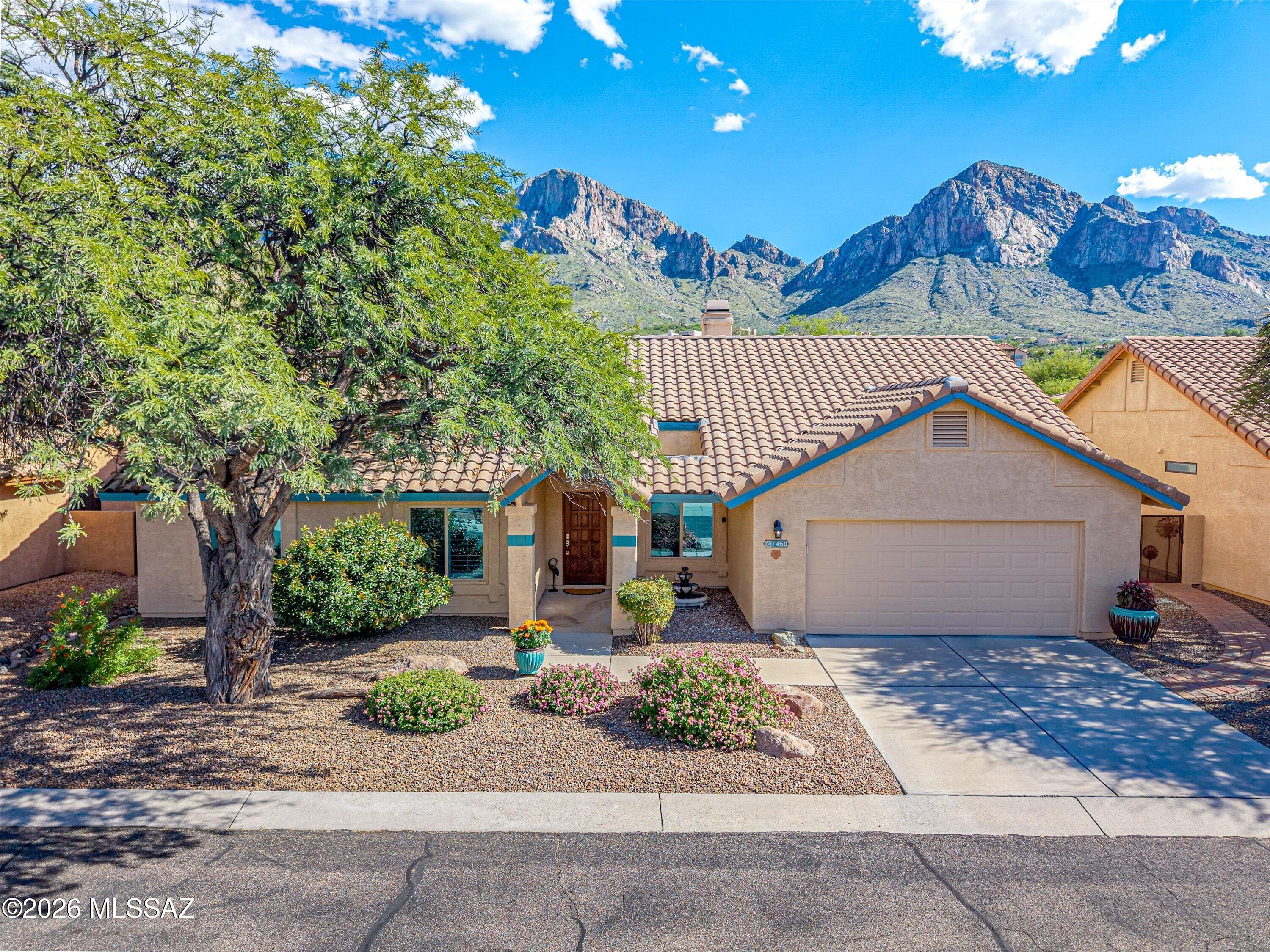 Enjoy the best Oro Valley has to offer in guard-gated La Reserve. This beautifully remodeled home features an opened-up great room with custom built-ins, a completely renovated kitchen, and fully remodeled primary and guest bathrooms. Matching granite countertops throughout the home create a cohesive look, while herringbone wood-look tile, plantation shutters, and custom closets add style and everyday convenience.
Thoughtful updates include newer roof underlayment (2022), a new water heater (2026), Samsung Bespoke smart appliances, dual-pane windows and sliders throughout, and an insulated garage door with a Wi-Fi-enabled opener. Soak away the day in your private, fully renovated in-ground spa or explore the neighborhood's easy access to dining, shopping, hiking, and The Loop.