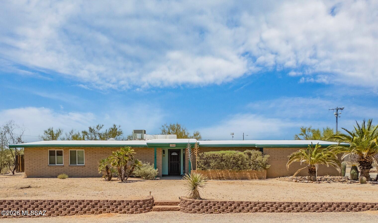 Desert Living with Endless Possibilities! Nestled on a sprawling 1+ acre natural desert corner lot, this classic masonry ranch offers, space, and freedom with no HOA. Featuring over 1,600 square feet of living space, this estate sale property includes 3 bedrooms, 2 bathrooms, and plenty of room for RVs, recreational vehicles, equipment, or future expansion. Enjoy Arizona's outdoor lifestyle with a newly plastered swimming pool, while major updates provide peace of mind, including a newer HVAC system (2023) and water heater (2020). The expansive lot offers a wealth of possibilities for gardening, workshops, storage, or simply enjoying the beauty of the surrounding desert landscape. A rare opportunity to create your own desert retreat with room to grow.
