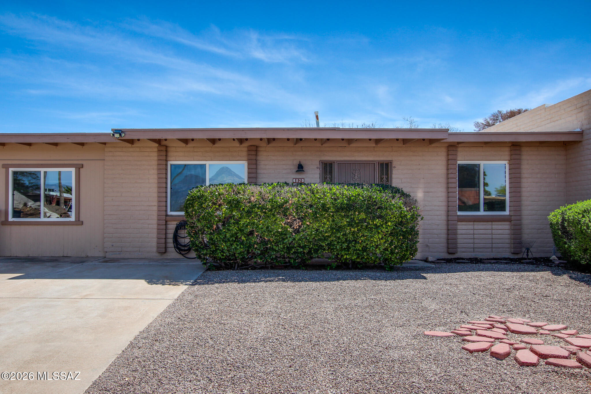 Move-in ready 3 bedroom, 1 bathroom townhouse on Tucson's desirable East Side. This well-maintained home has been recently refreshed with new interior paint, freshly cleaned carpets, updated outlets, a newly painted backyard fence, and a recently recoated roof. The functional layout offers comfortable living spaces with great natural light and flexible room options for family, guests, or a home office. A standout feature is the large backyard, offering rare outdoor space for a townhouse with room for pets, entertaining, or relaxing. Conveniently located near shopping, dining, parks, and major roadways with easy access to Davis-Monthan Air Force Base.