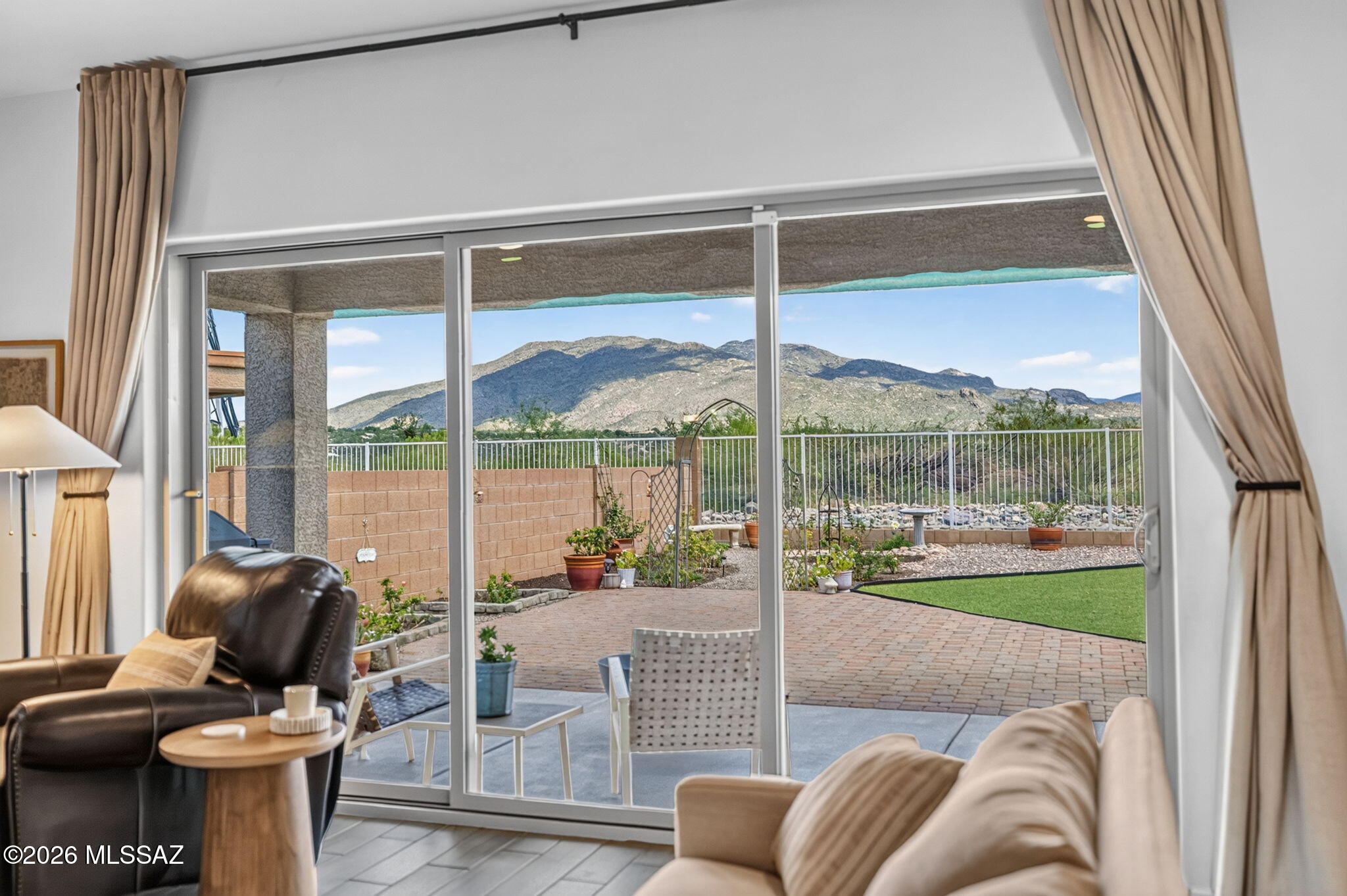 Clean, Clean, Clean. Impeccably maintained 3bd/3ba, Den plus Loft. Backs up to natural desert with fabulous views of the Rincon Mtns. Spectacular sunrise -moonrise.  Oversized sliding doors w/ vaulted ceilings provide amazing views from the great room and dining area. Nicely appointed kitchen with stainless steel appliances, large island walk-in pantry open to great room. Downstairs den is a perfect office, upstairs loft w/ views! Loads of natural light- move in ready...