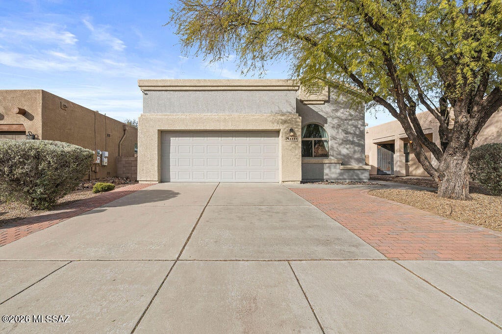 Range priced $285k-$295k. This move-in ready home has NO rear neighbors! You will love the split floor plan, featuring a spacious great room, and a den that can easily be converted to a 4th bedroom. The peaceful community features a community park, plus a pool & spa, and is located just minutes from the I-19, making commuting a breeze. All appliances will convey. The garage is extended, perfect for fitting larger vehicles. The backyard has been beautifully landscaped and features turf, trees, and a covered patio, allowing you to enjoy the unbeatable Arizona sunsets. In addition, there is a solar panel system on this house keeping your electric bill incredibly low year-round. Contact us today to schedule your tour!