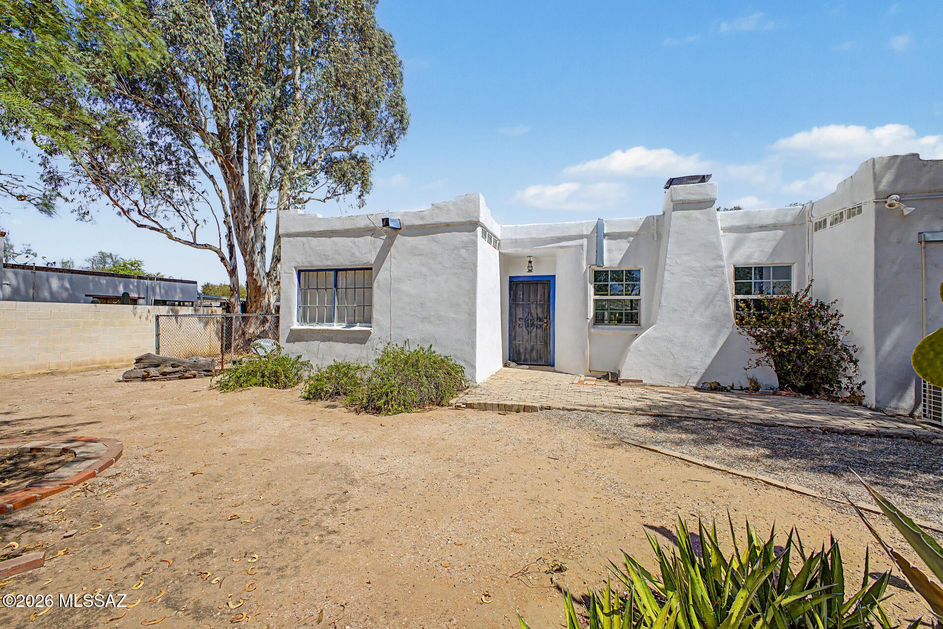 Vintage 1949 home with all the charm from that era. Reflecting post-war transitional architecture, blending early Mid-Century Modern design principles with classic desert-adapted features. Endless possibilities to either preserve the unique charm and style or go to town and revamp the entire interior. Split the lot or live in one and rent the other or make it a multigenerational home.