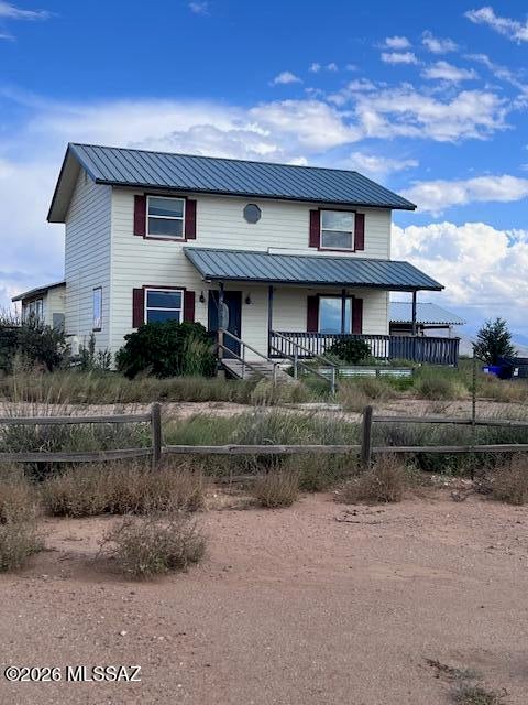Multiple parcels included includes 7 acres allowing for horse facilities, training and boarding facilities. At the base of the W mountain allows for plenty of places to ride. Two story house has plenty of bedrooms and bathrooms. A large metal workshop with rollup doors an additional hay barn, horse corrals, secure paddocks. Plenty of room for everyone.