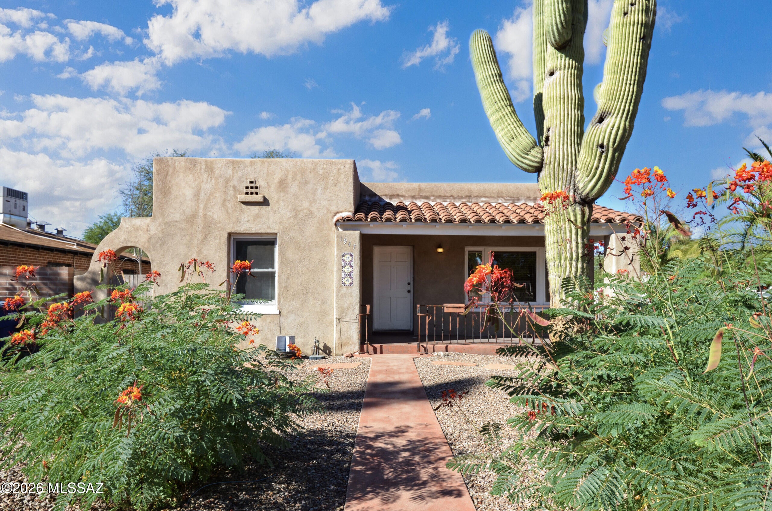 In Sam Hughes is a charming 1930s bungalow on a desirable corner lot, just a short distance from the University of Arizona campus. This home offers two comfortable bedrooms and one bath, original hardwood floors, and dual-pane windows. The kitchen features copper countertops and a newer side-by-side refrigerator, blending vintage character with updated conveniences. Ideal for those seeking a historic-feel home near campus. All TR Realty residents are enrolled in the Resident Benefits Package (RBP) for $55.00/month which includes liability insurance, credit building to help boost the resident's credit score with timely rent payments, up to $1M Identity Theft Protection, HVAC air filter delivery (for applicable properties), move-in concierge service making utility connection and home service setup a breeze during your move-in, our best-in-class resident rewards program, on-demand pest control, and much more! More details upon approval!
