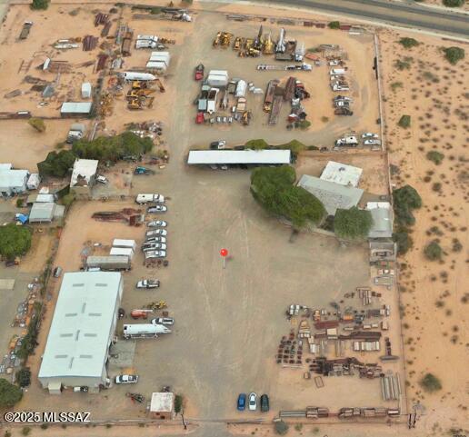 Incredible Investment Opportunity! Unlock the potential of these three adjacent parcels totaling over 4 acres in one of Tucson's fastest-growing industrial corridors! With unbeatable visibility, accessibility, and proximity to Tucson International Airport, I-10, and I-19, this parcel is a dream for warehousing, logistics, or commercial development. Parcel A features 97,661 sqft of land and includes a fully equipped office building with a conference room and a break room, plus several additional structures & a large warehouse. Parcels C & D are vacant lots offering 41,948 sqft each, providing endless possibilities for expansion or new projects. All three parcels are offered together for $1,850,000. A rare chance for investors and entrepreneurs ready to build big!