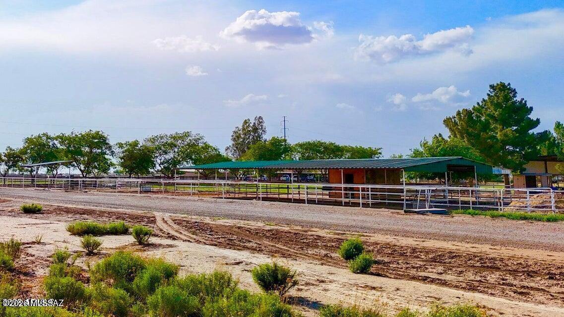 Beautiful acreage just outside the city. Power, well share, and irrigation all come with this lot making this the perfect property for your new site-built home in this neighborhood surrounded by horse properties and ranches. Additional adjacent lots available- total of 5 acres SELLER WILL CARRY with $ 7,475 down
