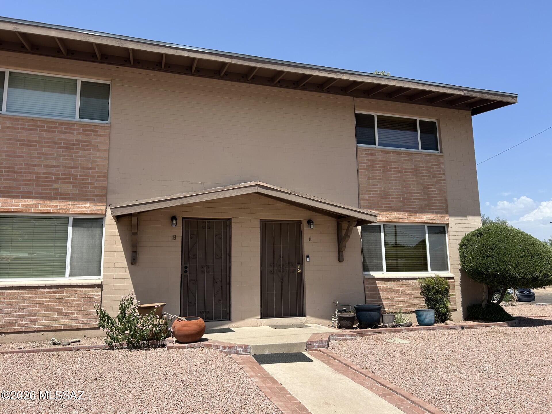 Immaculate 2 bedroom 1.5 bathe townhome in a convenient central location near Swan & 6th St. Quiet end unit with a large back patio to enjoy the cool Tucson evenings. This home features an updated kitchen, dual pane windows, roof is less than 1 year old. Easy care ceramic and wood laminate flooring. HOA handles exterior maintenance of buildings, front landscaping, garbage, and pool maintenance. This turn key home is ready for it's new owner!