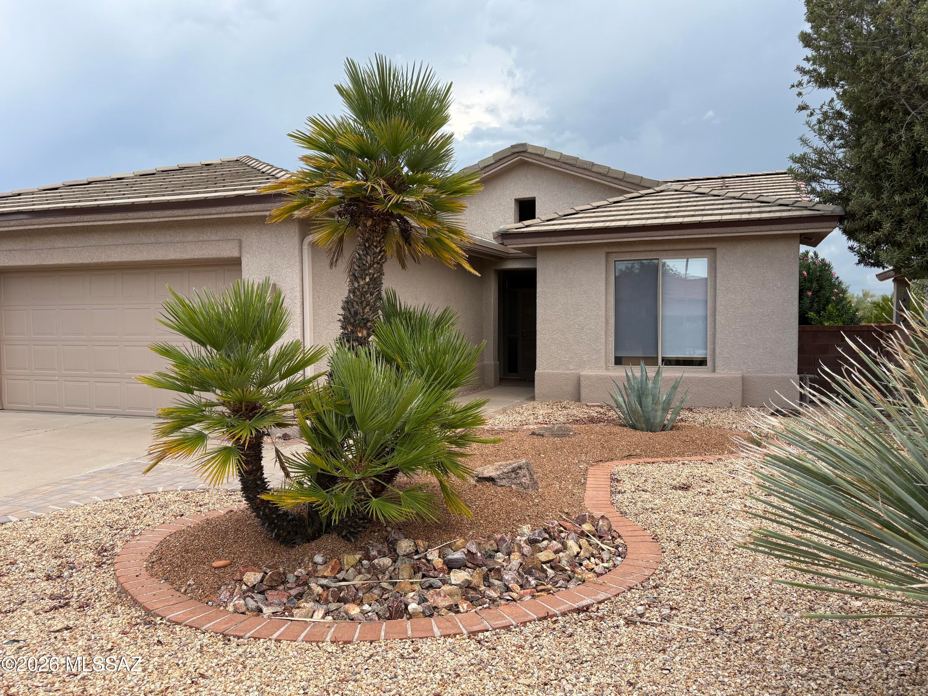 NEW OWNED SOLAR. New permitted sunroom for entertaining with Hunter Douglas shades, pergula with gas grill and refrigerator. Beautifully landscaped back with pavers, raised beds, firepit, artifical turf, and mountain views.
New fireplace w/ added brick, new Osmosis system, New water heater.
Roof with new underlayment and sewer clean out in 2025. Centrally located with easy access to GVR facilities, shopping and highway. Don't miss this opportunity!