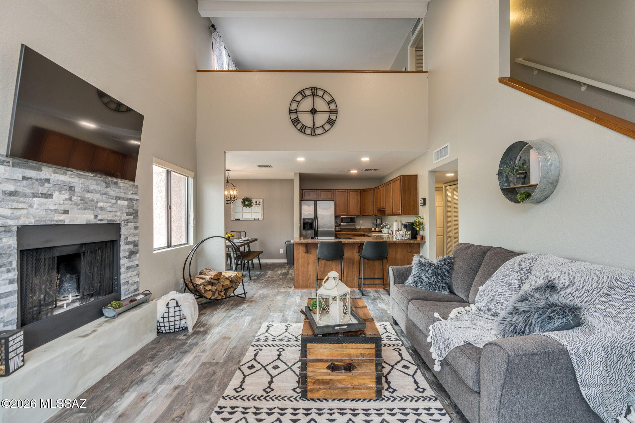 Experience quintessential desert living in this stunning two-story ''Rose Model'' condo near the coveted Sabino Canyon area in Tucson. Featuring 3 bedrooms and 2 bathrooms, this light, bright, and gorgeously decorated home is designed to appeal to a wide range of buyers. Soaring ceiling heights create an open, airy feel with beautiful views and natural light. The versatile floor plan includes two bedrooms upstairs (one a stylish loft-style retreat) and a third bedroom conveniently located downstairs, ideal for guests or a home office. Located in a gated community loaded with amenities, residents enjoy a gorgeous resort-style pool, two spas, pickleball and tennis courts, fitness facilities, and even electric Tesla charging stations--perfect for today's lifestyle. Personal furnishings are av ilable on a separate bill of sale, making this an exceptional move-in-ready, Airbnb/VRBO investment or lock-and-leave opportunity.
Enjoy nearby hiking and outdoor recreation just minutes from your door, along with easy access to restaurants, grocery stores, outdoor beer gardens, and schools. This is truly Tucson lifestyle living at its finest.