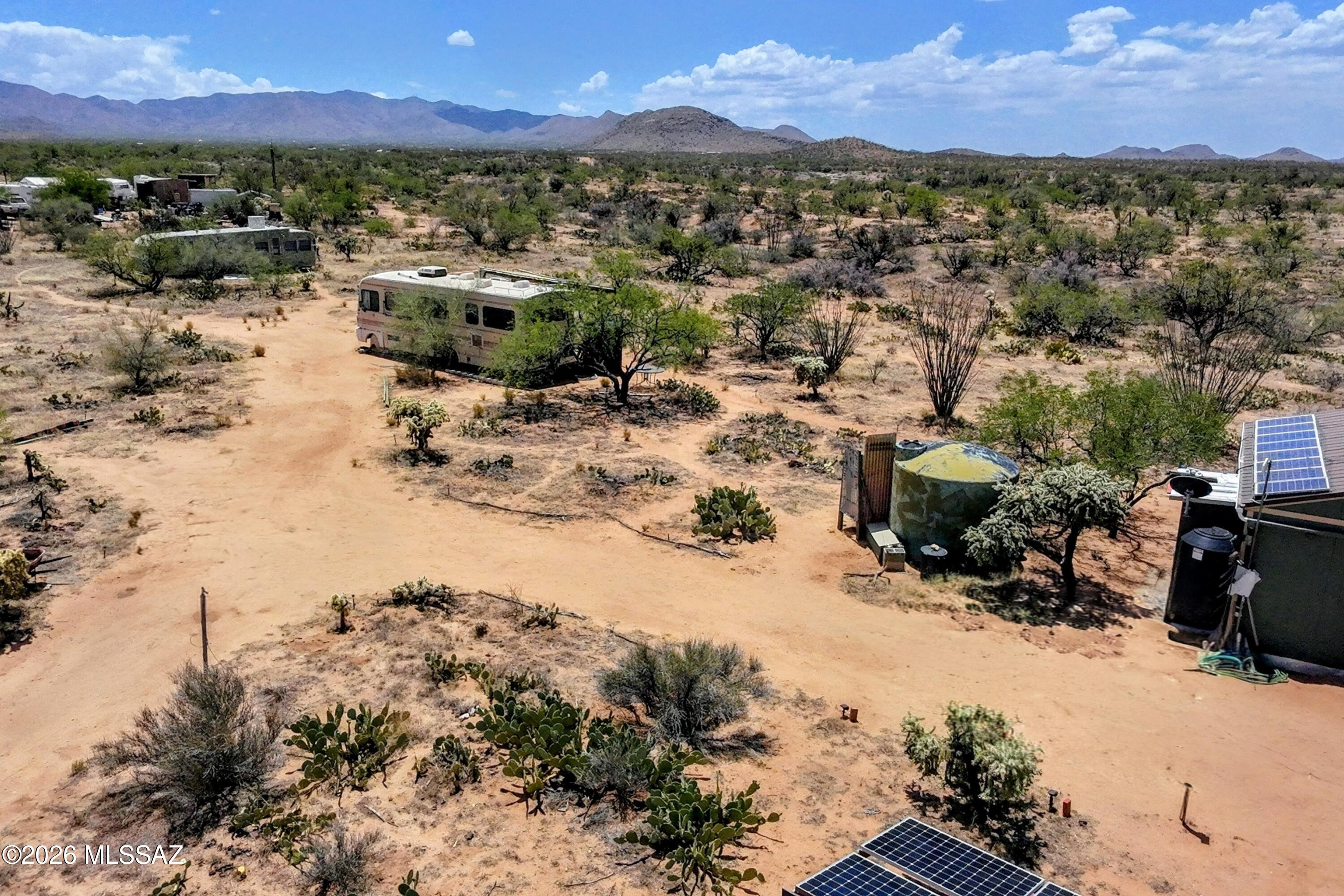 Escape to your own private nature retreat! This unique off-grid property is equipped with solar power, a 2,500-gallon fresh water storage tank, and both 600-gallon and 350-gallon rainwater collection systems. Surrounded by natural beauty and wide-open skies, this peaceful property is perfect for a weekend getaway, recreation, camping, or building your dream retreat. Enjoy the serenity, privacy, and breathtaking views this one-of-a-kind property has to offer.