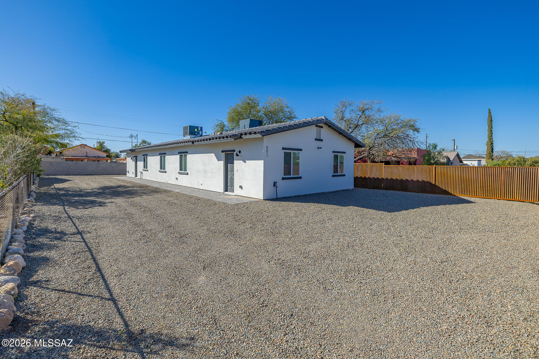 Rarely does a duplex check every box -- but this North Central new construction comes close. Positioned in one of Tucson's revitalization zones, this property combines a time-tested floor plan with  builder upgrades: mission tile roof, granite countertops, designer tile,  Situated on a large lot with access to the University of Arizona, Tucson Mall, and North Tucson's growing amenity base. Whether you're adding to your portfolio or starting one, this is the kind of asset that performs. Also ideal for owner occupants and let your tenant income subsidize your mortgage.  An additional Duplex is being built on lot is also available. Photos are of builders model