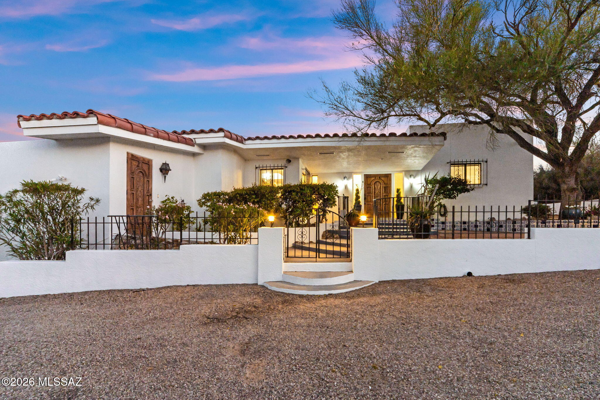 Rare opportunity to own a 2,875 sq. ft. home on 1.26 acres with no HOA. This well-maintained property offers 3 bedrooms and 3 bathrooms, including two primary en-suite bedrooms and a separate guest suite--ideal for multi-generational living or added privacy.
Enjoy Catalina Mountain and Pusch Ridge views from multiple vantage points throughout the home. The open-concept kitchen connects to the dining and living areas, featuring large windows that bring in natural light and showcase the surrounding desert landscape.
Interior features include a wood-burning fireplace, a spacious great room with high cathedral ceilings, and a functional floor plan designed to maximize views. The owner's suite includes private access to an outdoor spa area for added relaxation. Recent updates include interior and exterior paint, new carpet, baseboards, a new water softener, LED recessed lighting and roof updates with warranty. Property has been well maintained and is move-in ready.

Located in a quiet, established community with limited turnover. Convenient access to Oro Valley Country Club, El Conquistador Country Club, shopping, dining, and Catalina State Park with hiking and outdoor recreation.