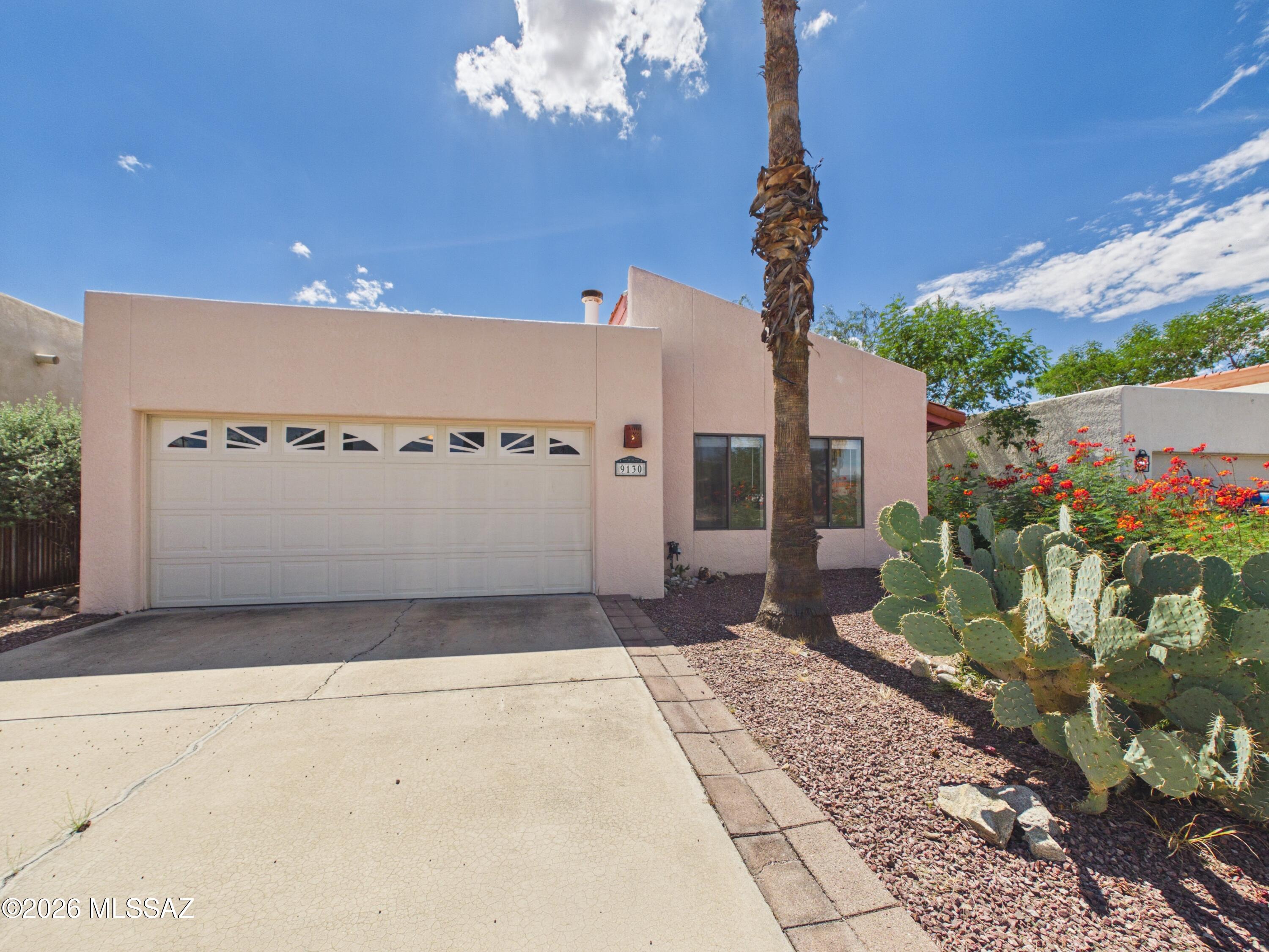 Welcome to this spacious Eastside Tucson home offering 3 bedrooms, 2 bathrooms, and 1,644 sq ft of comfortable living space. The open floor plan features high ceilings, abundant natural light, and multiple living areas. The kitchen offers granite countertops, stainless steel appliances, ample cabinetry, and a breakfast bar. The primary suite includes a private bath, while tile and vinyl flooring provide easy maintenance throughout. Enjoy the covered patio and low-maintenance backyard, perfect for relaxing or entertaining. A 2-car attached garage provides convenient parking and storage. Located in the Rolling Hills area with easy access to shopping, dining, parks, and major Eastside amenities.