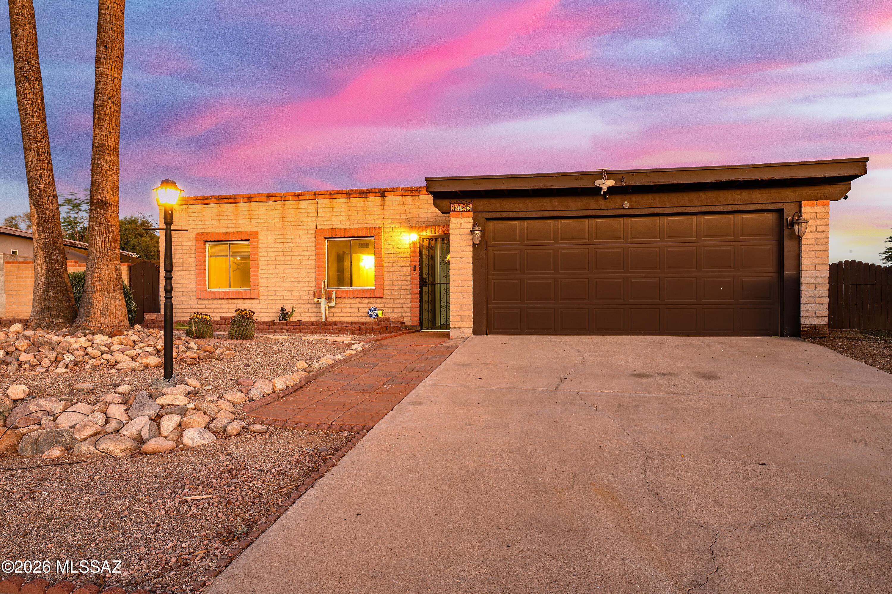 Welcome to this charming masonry-built ranch-style home in desirable Northwest Tucson. Offering 1,299 square feet of comfortable living space, this property features 3 bedrooms, 2 bathrooms, a 2-car garage, and a spacious backyard designed for both everyday living and entertaining.
The open-concept kitchen flows into the dining area and great room, featuring a cozy fireplace. Step outside to enjoy the large, covered patio and expansive yard, complete with dual side-entry gates, RV hookup, and ample room for recreational vehicles, boats, trailers, or additional parking.
Situated on a large lot with no HOA, this property offers flexibility. The home is conveniently located near I-10, schools, shopping, dining, and other everyday amenities. You'll also appreciate being within walking distance of Richardson Park.
Whether you're an investor seeking your next opportunity or a homeowner looking to add your personal touches, this property offers incredible potential.
Please note: the pool is currently empty.