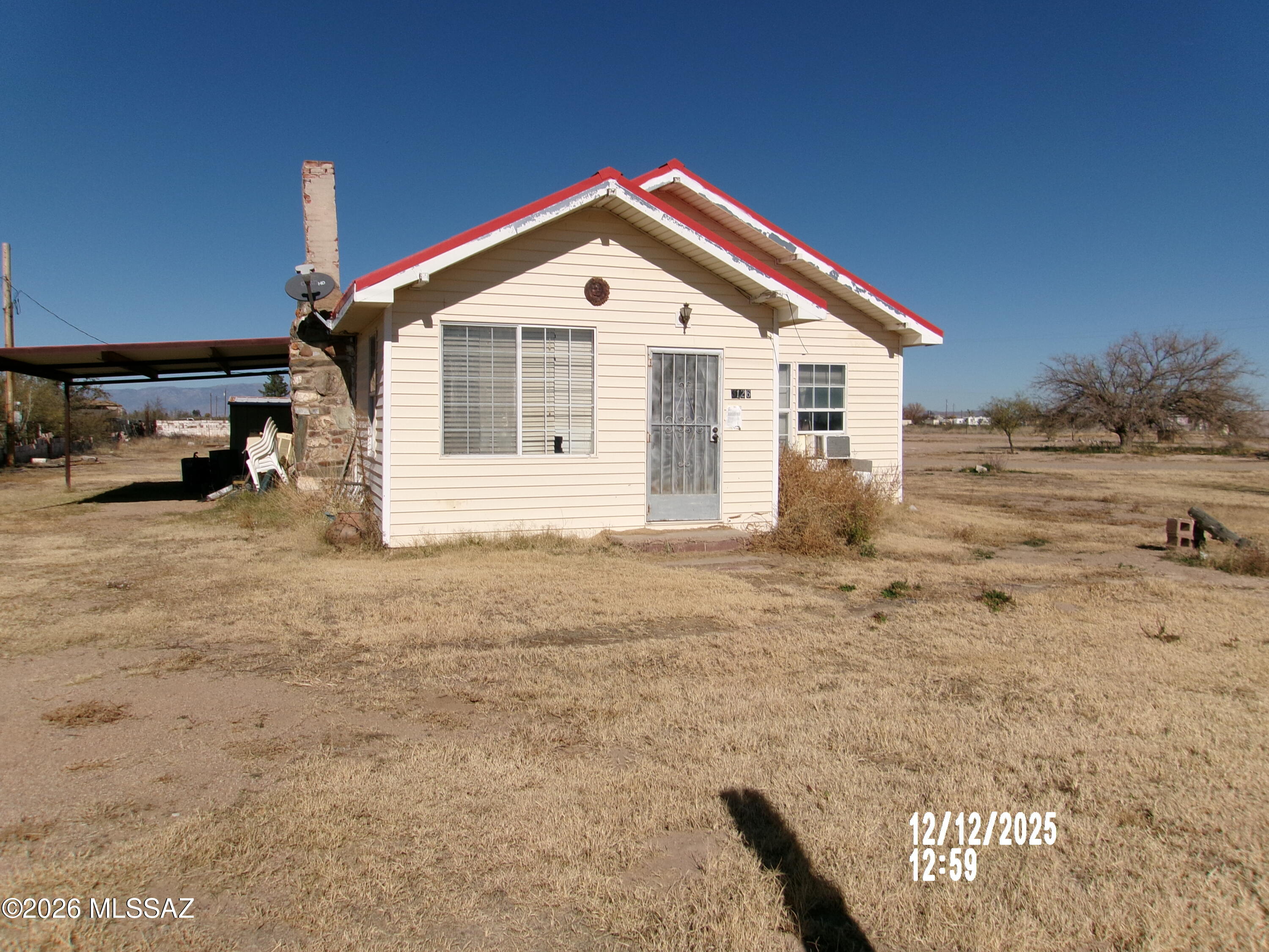 Nice curb appeal for this 2BR/1BA ranch style home on a 1.4 acre  parcel!  New siding and a bright red roof makes this home shine!  Some finishing touches are needed to truly enjoy this residence.  Convenient location,  close to shopping and all amenities plus I-10 for traveling. Panoramic views and red  majestic sunsets plus plenty of space for outdoor activities!  The Seller requires three days of MLS Exposure before reviewing offers.