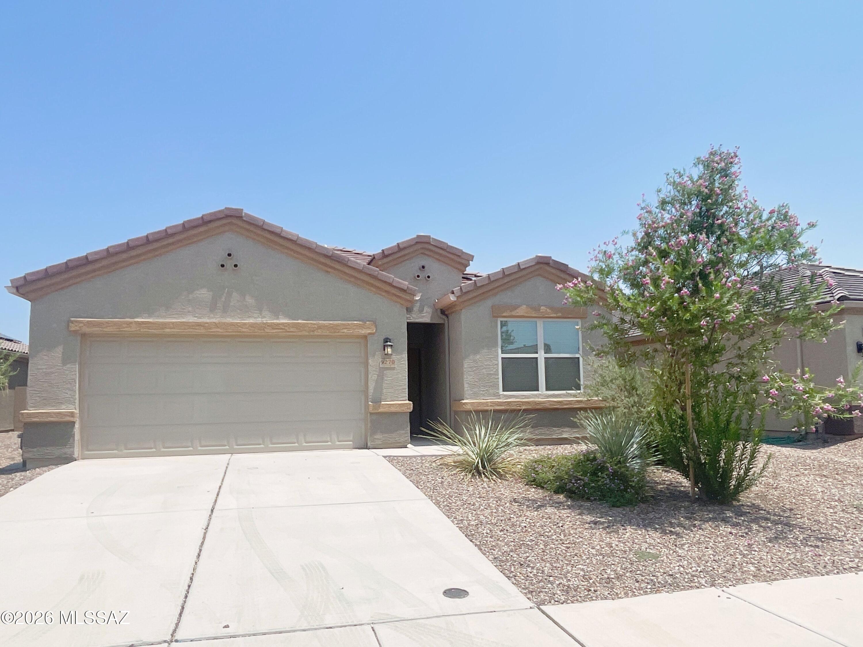 No Application Fees! Beautiful newer single level 4 bedroom, 2 bathroom Marana home offering a spacious open floor plan and numerous modern upgrades. This well-maintained home features tile flooring throughout all high traffic areas with neutral carpeting in the living room and bedrooms, neutral paint, high ceilings, upgraded LED lighting, 2-inch faux wood window blinds and honeycomb shades, ceiling fans in each room, and great natural lighting. The open floor plan provides excellent living space with a formal dining area and large living room featuring direct backyard access. The beautifully upgraded kitchen features granite countertops and backsplash, oversized center island with breakfast bar, upgraded cabinetry, separate pantry, gas range, all appliances, and ample cabinet and counter space. The desirable split floor plan provides additional privacy with an oversized primary suite featuring a large walk-in closet and private bathroom with a dual sink vanity and spacious step-in shower. Three additional bedrooms provide comfortable living space for family, guests, or a home office. A full-size washing machine and dryer are included for added convenience, and the attached two-car garage provides ample parking and storage space.

Enjoy the large neighborhood park with children's playground and sparkling community pool offering excellent opportunities for outdoor recreation and relaxation. Convenient Marana location close to shopping, restaurants, schools, golf courses, hiking and outdoor recreation, Dove Mountain, and the growing Northwest Tucson employment corridor with access to I-10 and destinations throughout Marana and Tucson.

All residents are automatically enrolled in the Resident Benefits Package (RBP) for $55.00/month which includes Renter's Liability Insurance, Credit Building to help boost the resident's credit scores with timely rent payments, up to $1M Identity Theft Protection, HVAC air filter delivery (for applicable properties), our best-in-class resident rewards program, and much more!