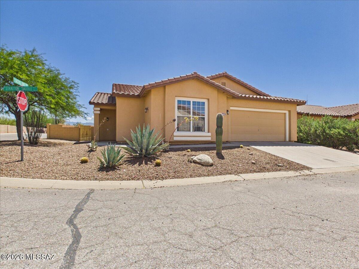 Move-in ready and beautifully maintained, this North Ranch home offers a bright, open layout designed for comfortable everyday living. The spacious living areas flow seamlessly into a well-appointed kitchen, perfect for both relaxing and entertaining. Generous bedrooms provide flexibility for guests, a home office, or additional living space. Step outside to a private backyard ideal for enjoying Arizona living year-round. Located in a desirable northwest Tucson neighborhood close to shopping and dining, this home is ready for its next owner to enjoy from day one.