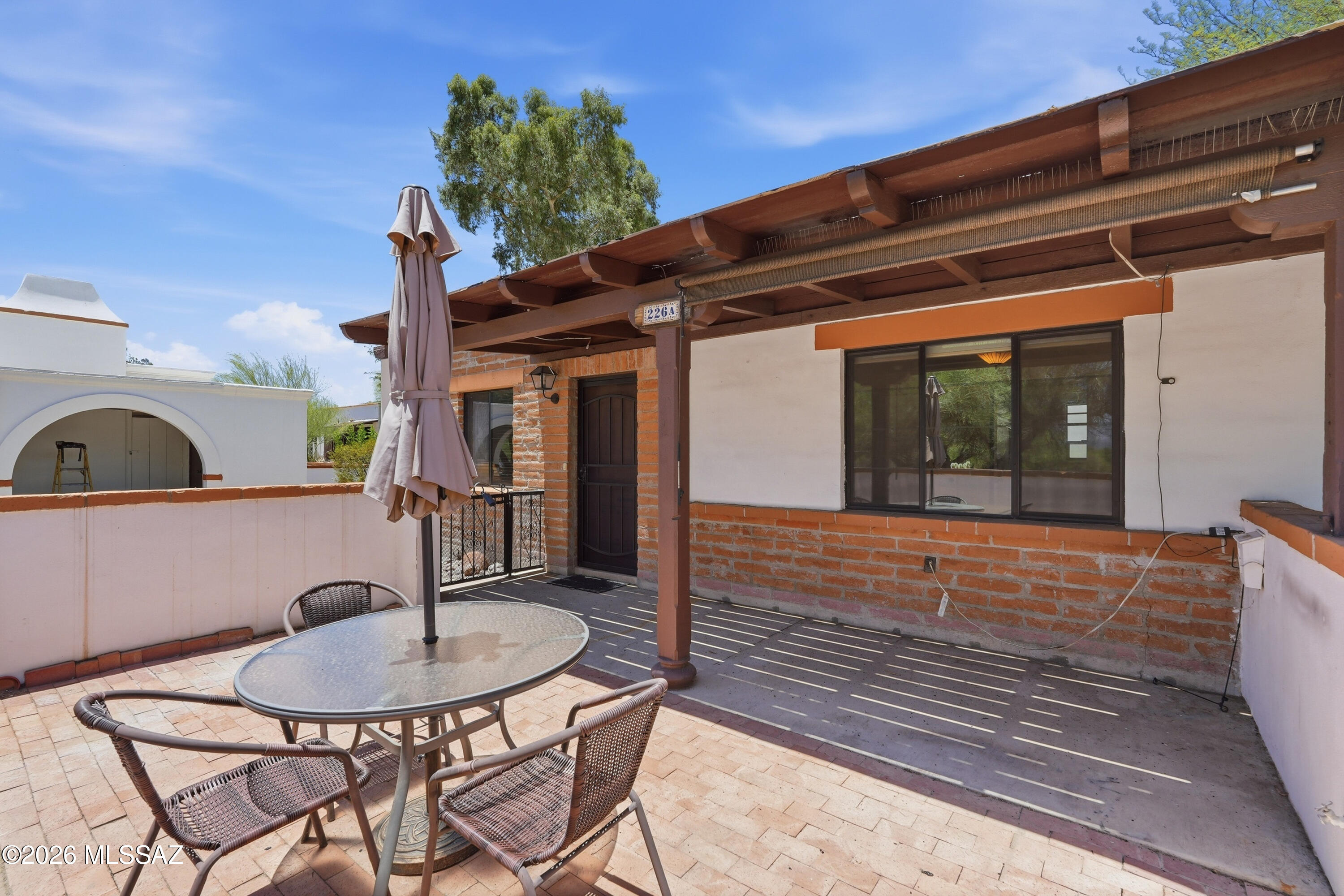 Remodeled and upgraded 2 bedroom Villa. Features include newer kitchen with cabinets and newer appliances, glass top range and build in microwave and large refrigerator. The second bedroom has built-in cabinets and a China cabinet.  Primary bedroom has 2 custom closets; bathroom has a large walk-in shower all new cabinet and fixtures. title bathroom floor. the living area has a wood look title floor. This kitchen max. storage and many features to enjoy. back storage room has a washer only. Front patio is great for entertaining.