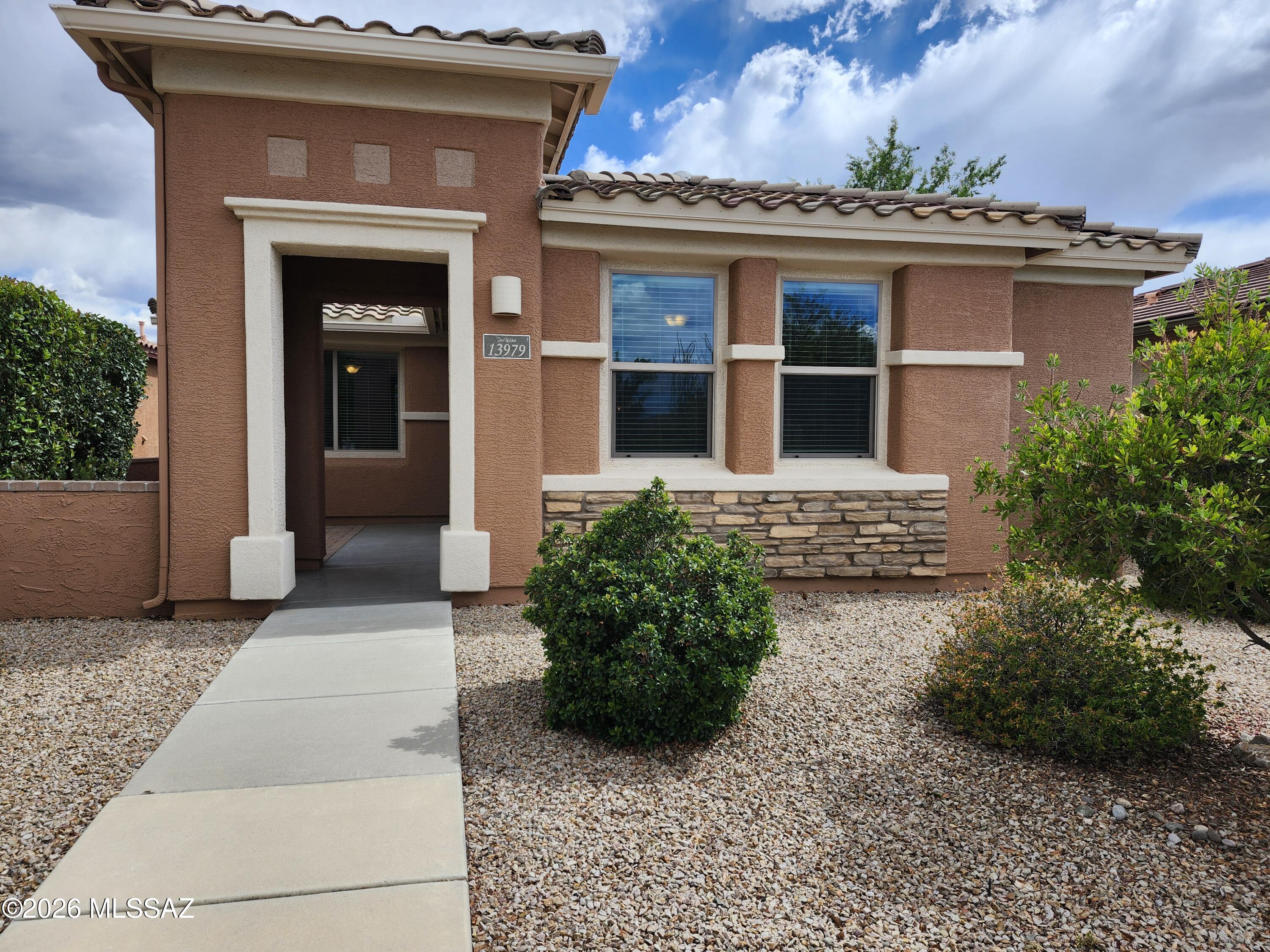 This beautifully maintained 2BR + den / 2BA home offers 1,568 SF of comfortable living in the desirable gated, active adult community of Del Webb at Rancho del Lago. This charming 50+ gated community offers the perfect blend of comfort and convenience. The interior features plush carpet in the bedrooms and stylish 18 X 18 tile throughout the main living areas. The spacious primary bedroom boasts a walk-in closet and a newly remodeled primary bath with dual vanities. . Additional highlights include a large breakfast bar, spacious pantry, reverse osmosis system, and water softener. Residents can take full advantage of the community's outstanding amenities, including tennis and pickleball courts, a 14,000 SF recreation center with billiard room, web café, state-of-the-art fitness center, and resort-style pools and spa.This low-maintenance gem is ready for you to call home--schedule a tour today! We do a credit, background and rental history check on all applicants, anyone over 18 must apply. Please call Daniel with questions or to schedule a showing. 520-777-6507 ext. 5 - Tucsonterritorypm.com for applications and walk thru video- please read thoroughly before applying. Tucson Territory represents the Owner of the property.