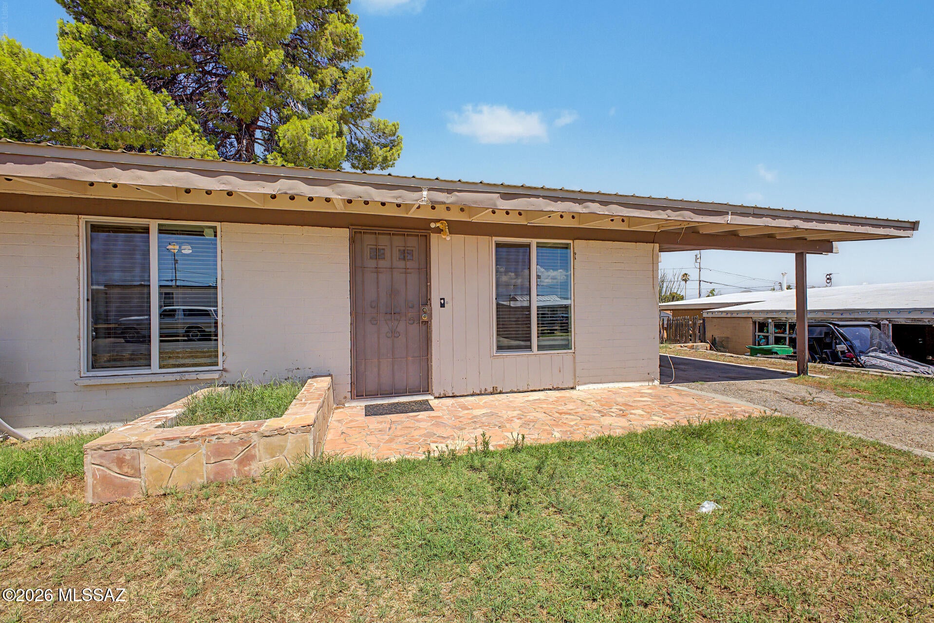 Discover this charming 3-bedroom home in San Manuel! Step inside to discover Saltillo tile flooring and a bright, airy living/dining room with vaulted ceilings. The kitchen features oak cabinetry, generous counter space, and stainless steel appliances. The primary bedroom offers a private bathroom and a walk-in closet, while all bedrooms include cozy carpeting and ceiling fans for comfort. Enjoy a spacious backyard complete with a covered patio, laundry area, storage shed, and plenty of room to make your own. This inviting home is a blank canvas ready for your personal touch. Don't miss this opportunity!