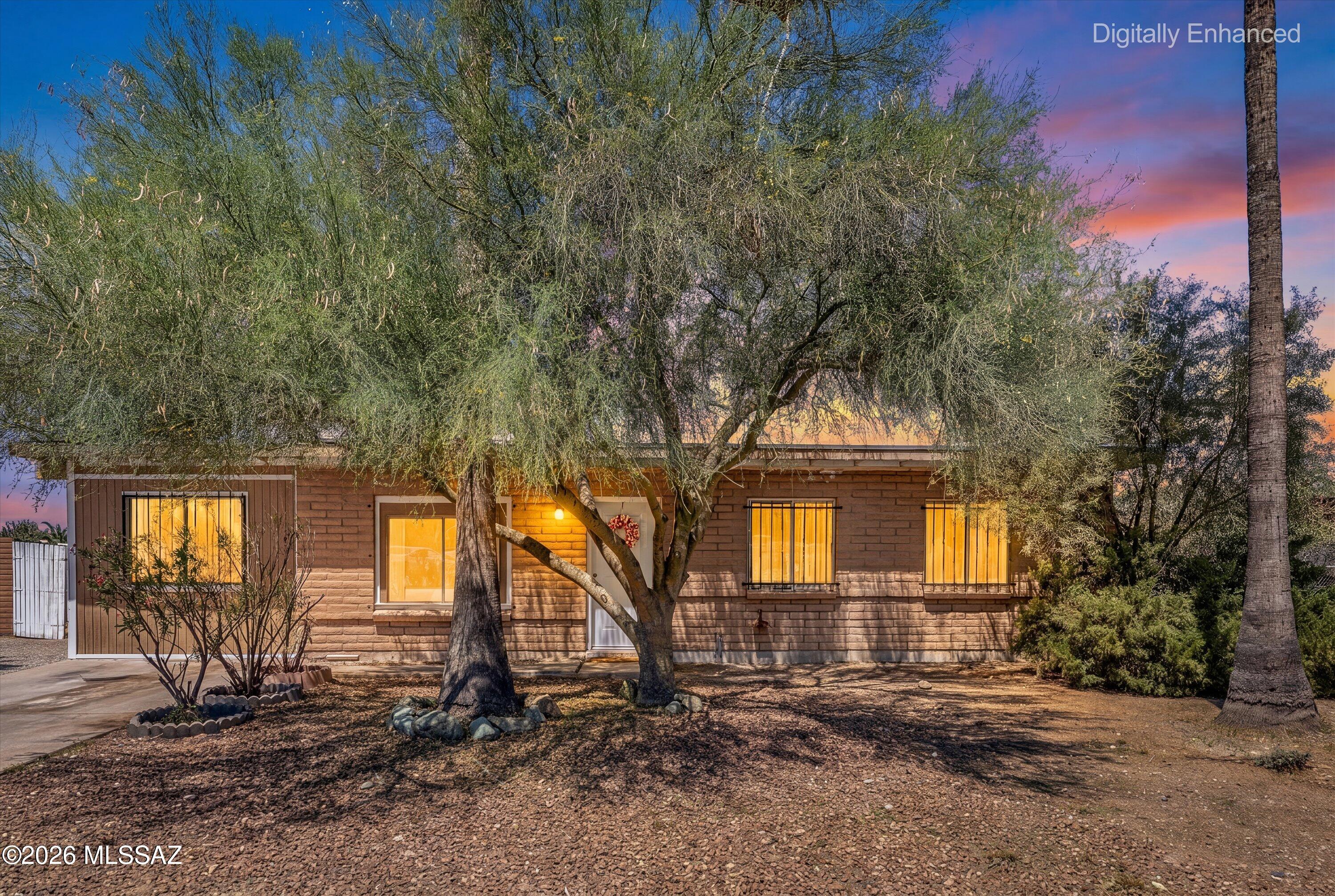 Affordable, updated, and packed with  potential, this centrally located Tucson home offers an incredible opportunity for homeowners and investors alike! Conveniently situated near Costco, shopping, restaurants, schools, and everyday amenities, you'll love the ease of living in one of Tucson's most accessible locations.
This single-story home features a functional floorplan with a versatile bonus room that can easily serve as a home office, playroom, hobby space, second living area, or whatever best fits your lifestyle. Thoughtful updates have already been completed throughout much of the home, including updated cabinetry, newer air conditioning, a newer roof, renovated bathrooms, and durable vinyl flooring that is both stylish and pet-friendly. While many of the major improvements have already been made, some areas have been left for the next owner to add their own finishing touches and personal style, creating a fantastic opportunity to build equity while making the home uniquely yours.
Outside, the generous backyard offers a blank canvas ready for your vision. Whether you're dreaming of a garden, outdoor entertaining space, play area, workshop, or simply room to relax, the possibilities are endless. Plenty of parking adds to the home's functionality and convenience.
Perhaps one of the biggest advantages is NO HOA, providing the freedom and flexibility that many buyers are searching for. Whether you're a first-time homebuyer looking for an affordable place to call home, an investor seeking a strong rental opportunity, or someone looking for a property with room to customize and grow, this home offers exceptional value in a prime Tucson location.
Affordable homes with major updates, no HOA, and a central location close to everything Tucson has to offer don't come along often, don't miss your opportunity to make this one your own.