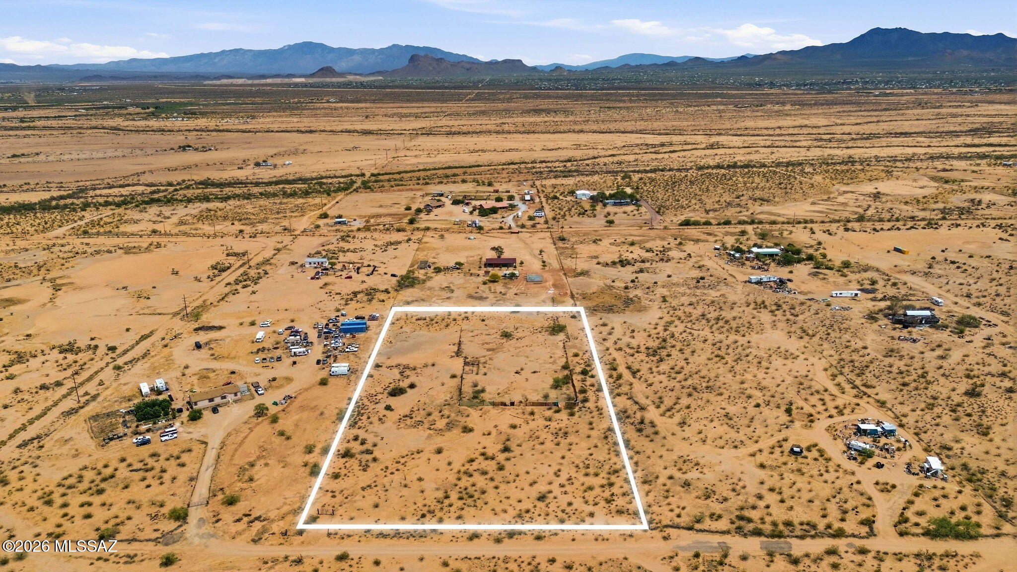 Build your vision from the ground up on this expansive 5-acre vacant lot at 15195 W Scrub Brush Road. Offering wide-open space and endless possibilities, this property is ideal for those seeking privacy, room to grow, or an investment opportunity in a peaceful setting. Enjoy breathtaking desert landscapes, stunning sunrises and sunsets, and the freedom of rural living while still being within reach of nearby amenities. Whether you're planning to build your dream home, place a manufactured home, or hold as a long-term investment, this versatile parcel provides the space and flexibility to make it happen. With plenty of room for horses, toys, and outdoor living, the potential here is truly limitless. Don't miss the chance to own your own piece of Arizona land!