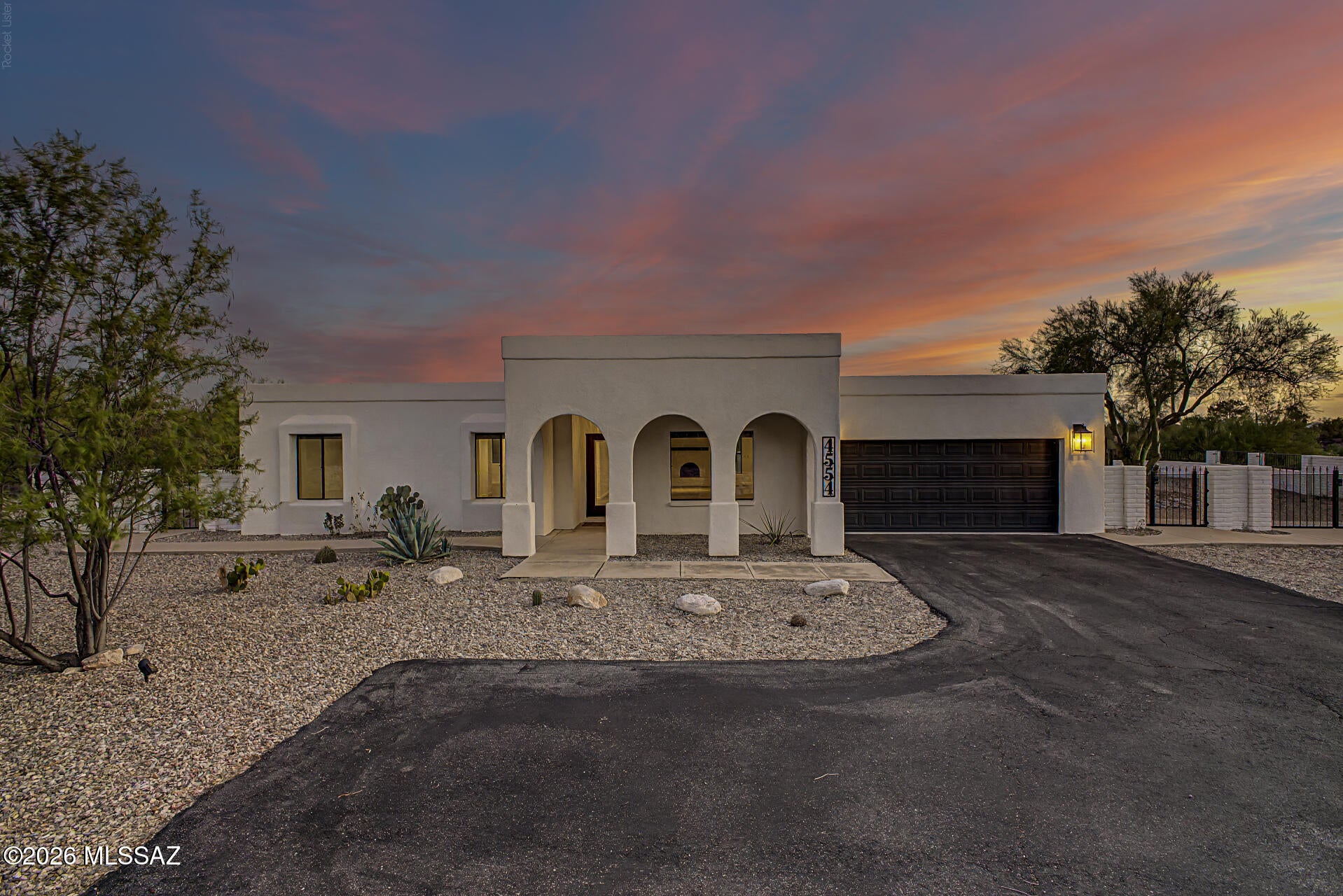 The perfect combination of space, privacy and incredible Tucson views. The spacious kitchen is the heart of the home, featuring an oversized island, equipped with soft gray shaker cabinets, a tile backsplash, quartz countertops, stainless steel appliances. Warm architectural details including decorative beam ceilings, custom lighting, plank flooring and a cozy wood-burning fireplace add character throughout. The primary suite offers a private retreat with a walk-in closet and beautifully updated bathroom with a deep soaking tub. Step outside and enjoy what Foothills living is all about--mountain views, colorful sunsets, and star-filled skies from the expansive, fully walled backyard. A large entertainment patio, custom pavers and hot tub create a wonderful outdoor setting, while the double gate and available RV parking provide added flexibility.

Located near shopping, dining and everything the Catalina Foothills has to offer. Beautifully updated, move-in ready and set on a generous lot--this is Tucson living at its best!