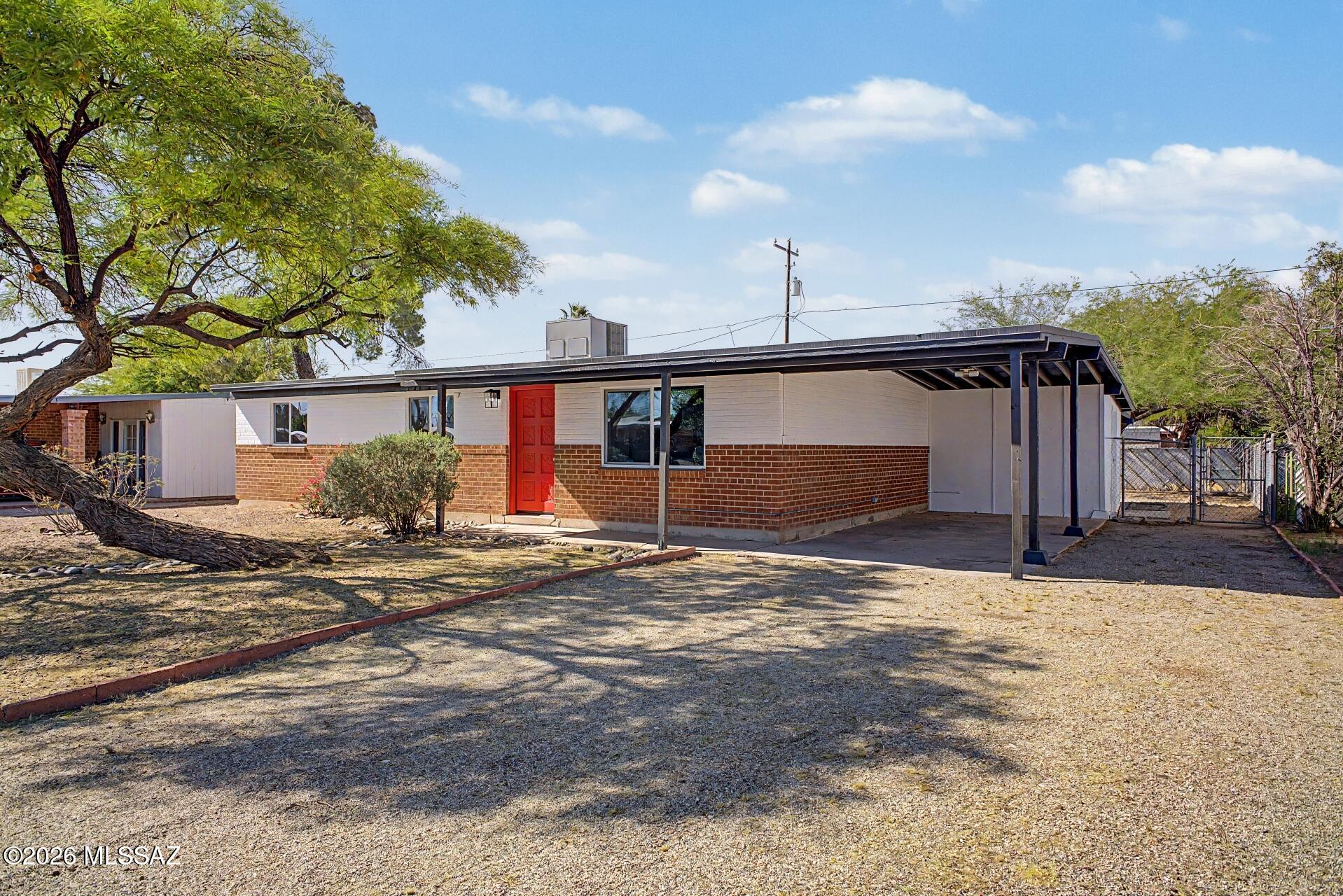 Welcome to this beautifully renovated brick-style home, ideally located on Tucson's sought-after East Side. Conveniently close
to Park Place Mall, Reid Park, and Davis-Monthan Air Force Base, this property offers the perfect blend of comfort and
accessibility. Step inside to an inviting open-concept floor plan designed for modern living, featuring a bright and versatile Arizona room.  Perfect for relaxing or entertaining year-round. With thoughtful upgrades throughout, this home is truly move-in ready. Whether you're a first-time buyer or searching for your next ideal home, this property is ready for you to make it your own.