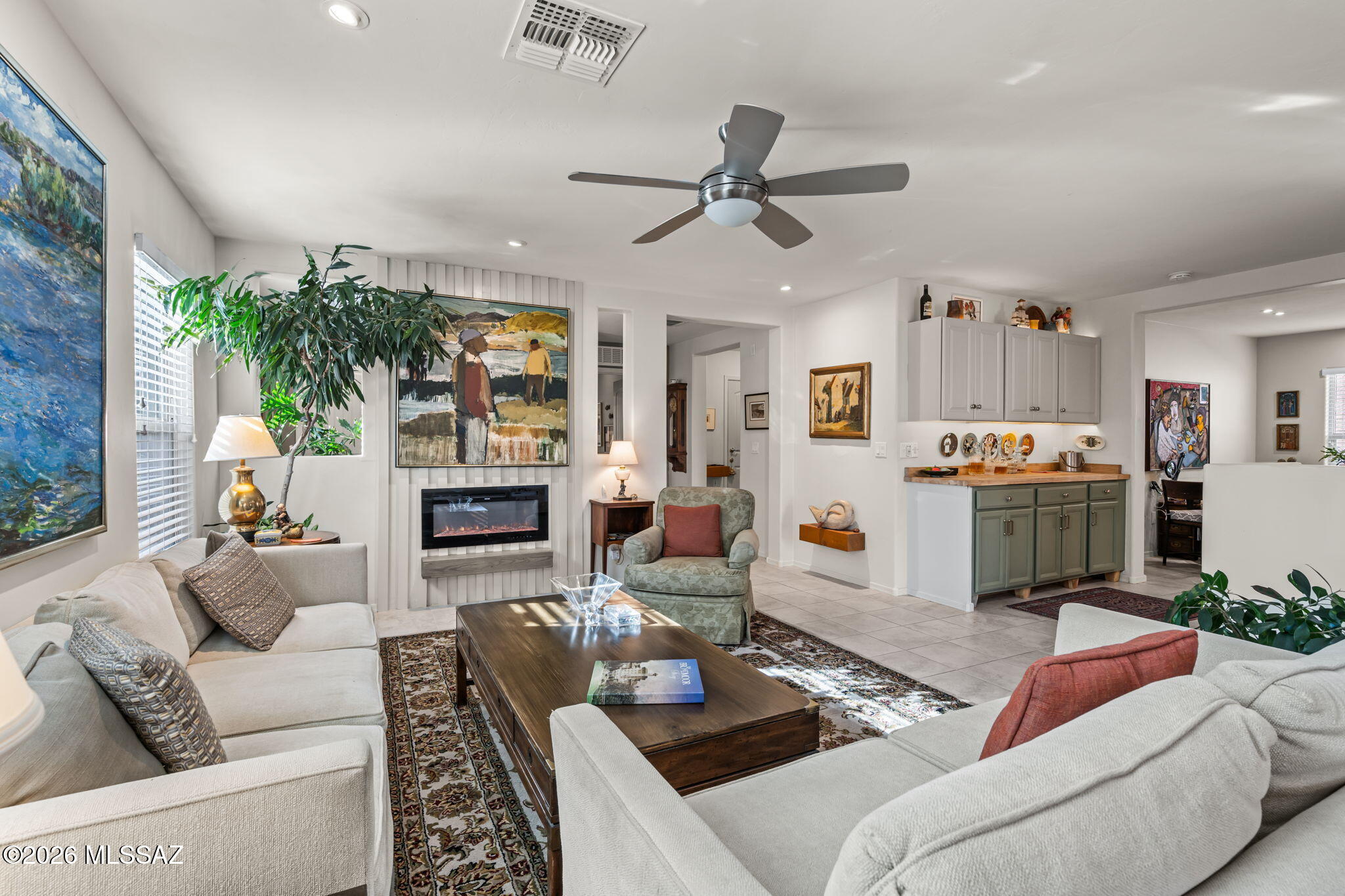Beautifully updated Home, 1,849 sq ft, 3 bed / 3 bath. Reimagined kitchen with added storage, new cabinet paint,  hardware, and butcher block counters alongside Corian. Partial wall between kitchen and living room adds cozy definition; extra room off the kitchen. Two electric fireplaces. Lovely backyard plumbed for a gas grill with abundant yard lighting. Separate ensuite provides additional privacy for guests or family.   Move-in ready and full of character. Close to Ryan Air Field, Casino Del Sol,  Trapp and Skeet shooting.