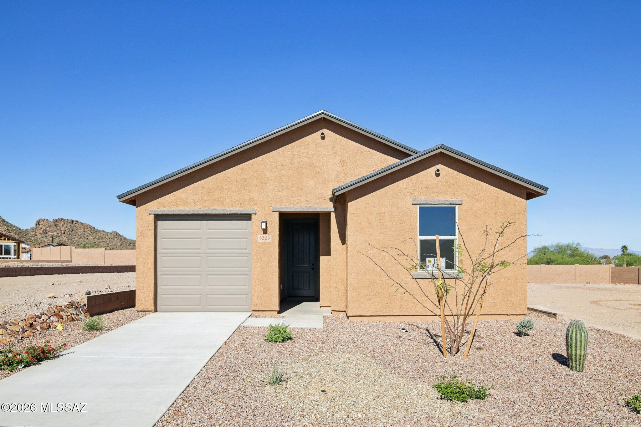 This charming, single-story home showcases an open floor plan with airy 9-ft. ceilings and sleek ceramic tile flooring throughout. Overlooking the great room, the kitchen is equipped with modern Whirlpool® stainless steel appliances and 42-in. upper maple cabinets. The bathroom includes a walk-in shower and extended vanity. Additional features include a soft water loop and dedicated laundry room. Ask about interest rate promotions. Price includes discount predicated on using seller's preferred lender KBHS. Property taxes are not available to date.