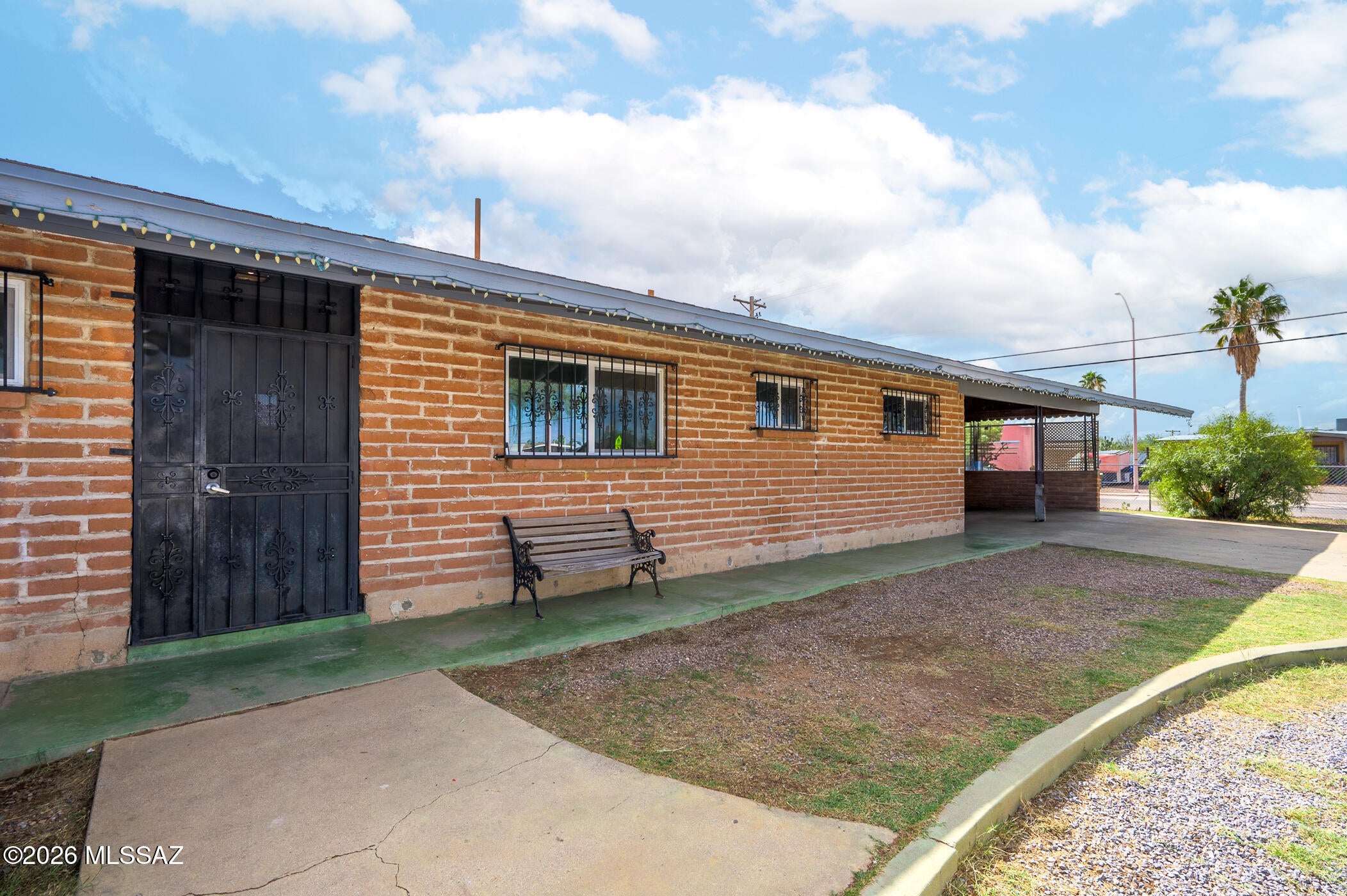 Enjoy comfortable living in this 3-bedroom, 2-bath brick home on Tucson's south side. Offering 1,639 sq. ft. of living space, the home features a practical layout, a large yard with room to relax or entertain, and extra storage for added convenience. A two-car carport provides covered parking. A great opportunity to make this inviting home your own.