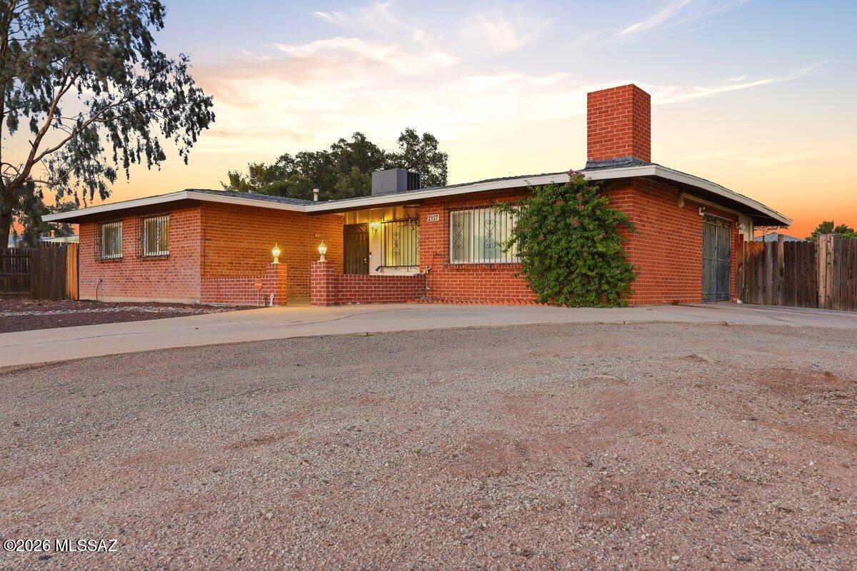 Range priced from $320,000-$335,000. Space, location, and backyard built for Arizona living. Situated on a generous corner lot in the desirable Terra Del Sol neighborhood, this 3-bedroom, 2-bath brick home offers 1,572 sqft of comfortable living space. Inside, you'll find a spacious den/family room with a fireplace, double pane windows & a whole home water softening system as well as RO to the fridge and kitchen sink. Outside you'll enjoy a huge 0.32 acre lot, an 8-foot-deep pool, covered patio, expansive yard with a 12x12 storage shed  and plenty of room to entertain. A wide driveway offers parking for multiple vehicles, making this home as practical as it is inviting.