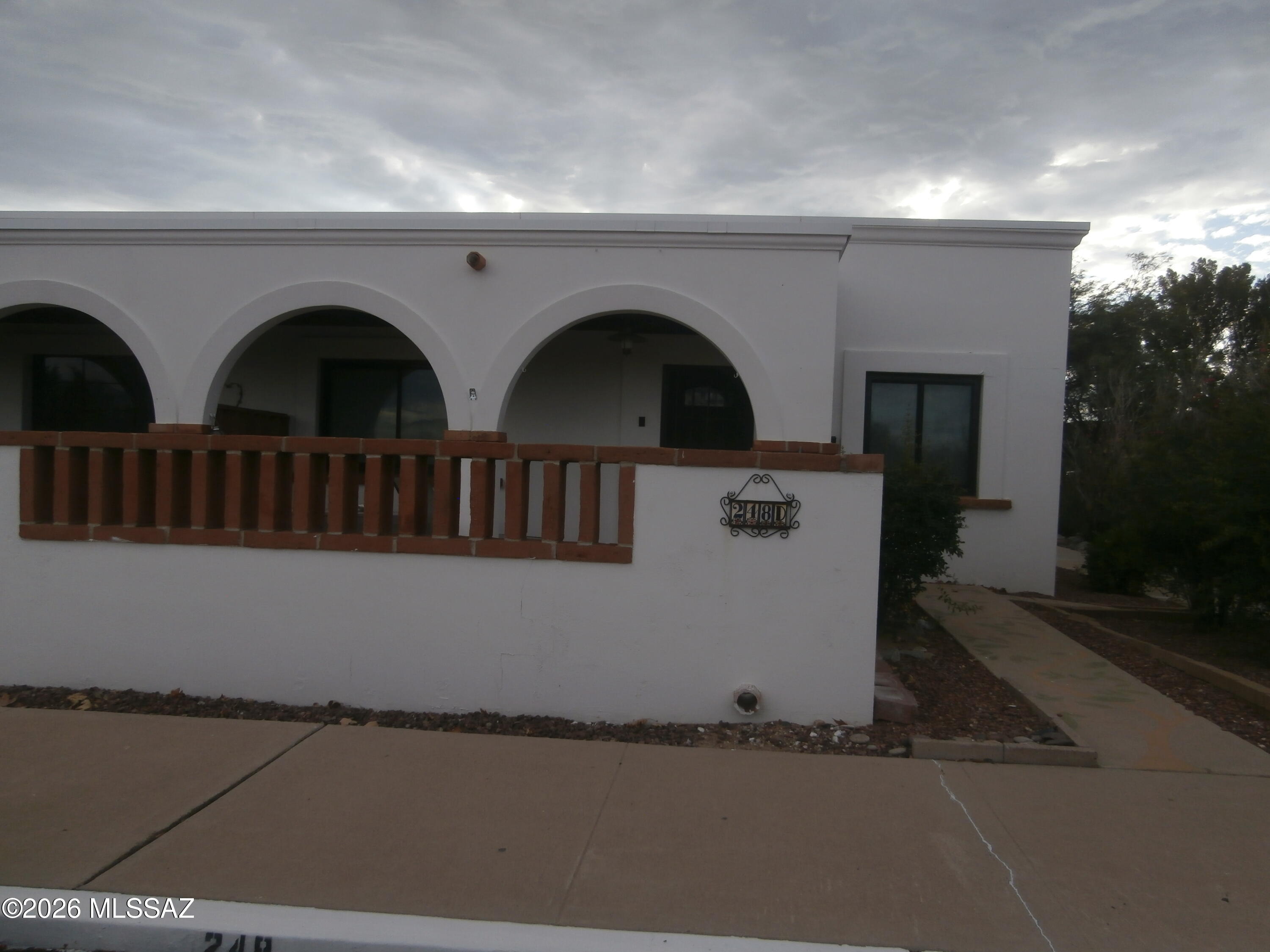 Nice 2 bedroom, one bath, front parking, end unit in Villas East. Unit has been  remodeled new windows, all tile floors.  Kitchen has new cabinets, full size gas stove and full size fridge, washer/dryer in kitchen.
Bath has new vanity and shower tub combo.
there is all year round heat pool and laundry mate on site. Unit has Green Valley Rec if you choose to join.  Partial mountain view from front patio.  This is a great unit must see.
55+ Price reflects a one year lease.