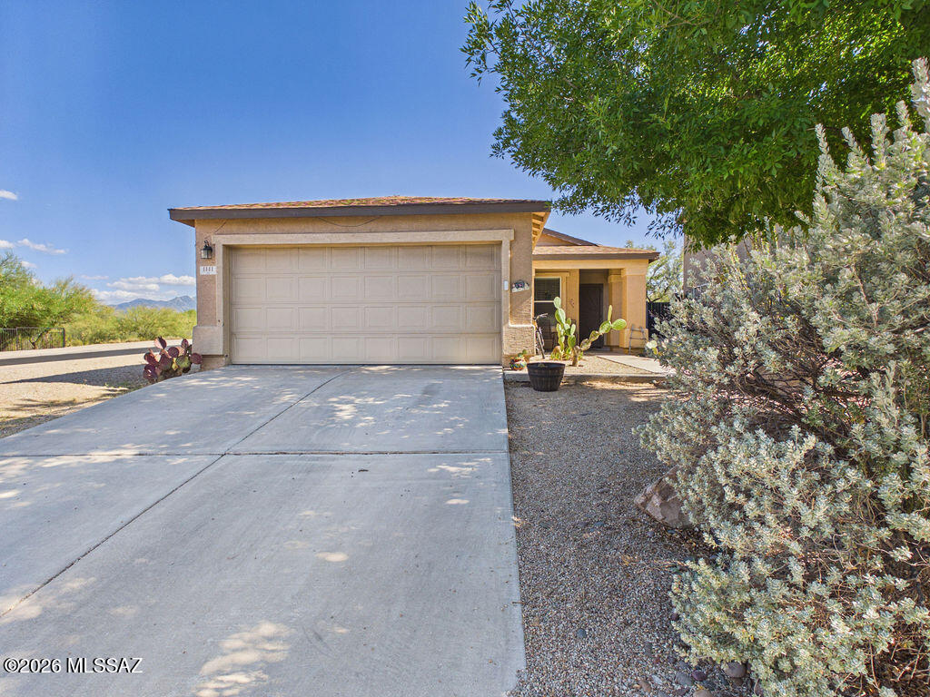 Welcome to your new home in beautiful Sahuarita, AZ! This charming 4-bedroom, 2-bath retreat offers a bright, open floor plan perfect for family living and entertaining. The spacious kitchen flows into the cozy living area, while the primary suite provides a peaceful escape with its own private bath. Enjoy desert sunsets from the backyard, ideal for gatherings or quiet evenings under the stars. Located in a friendly neighborhood close to parks, schools, and local amenities, this home blends comfort, convenience, and a touch of Southwest charm. Come see why this inviting property won't last long!
