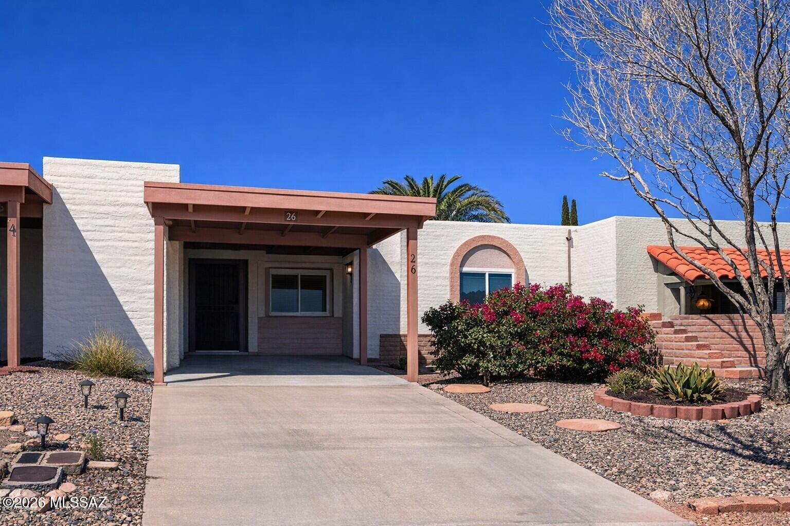 ASSUMABLE LOAN-Nestled in a quaint, friendly neighborhood, residents have access to scenic walking trails, a community clubhouse, pool, and ramada--perfect for social or leisurely activities. Ideally situated close to shopping, restaurants, coffee shops, and on the bus line for easy transportation.
This 965 sq ft townhome offers 2 bedrooms, 2 baths, and great outdoor living. Enjoy a covered rear patio overlooking a private, block wall enclosed backyard with a convenient walk out gate. The home includes a dedicated carport with extra storage.
With low HOA fees, low property taxes, and membership in Green Valley Recreation, this home represents an excellent value in a prime location.
ASSUMABLE LOAN
