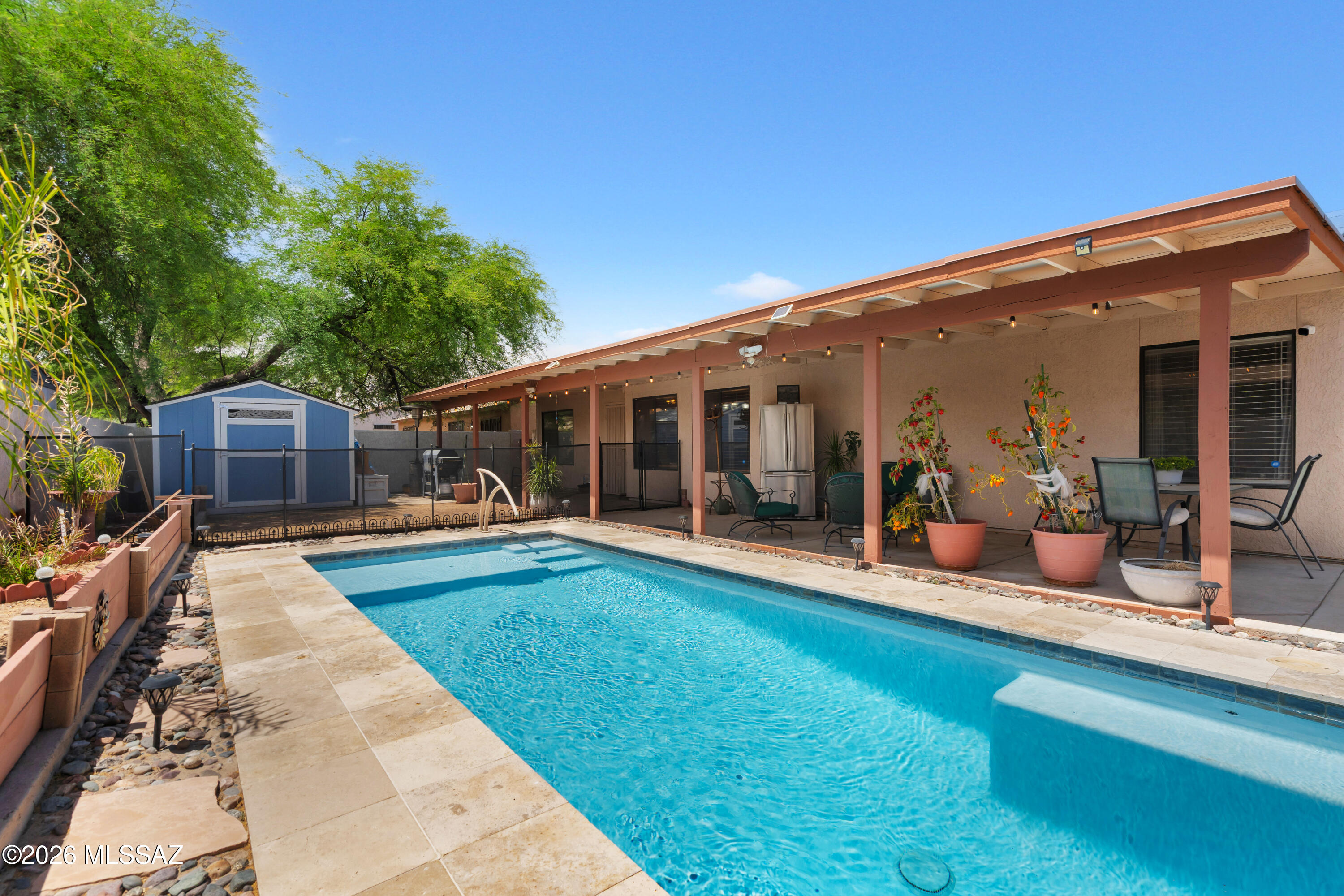 Step into this beautifully updated summer retreat home featuring a brand new swimming pool!! Home has 4 ample bedrooms and 2 bathrooms, designed with both comfort and style in mind. Recent upgrades include brand-new kitchen appliances, bathroom cabinetry, modern countertops, a new roof, fresh carpet and paint, and a fully refreshed hall bathroom with a new shower and tub. Home also features a new AC system along with a new water heater.
The split-bedroom floor plan offers added privacy, while the open layout highlights a convenient breakfast bar--perfect for casual dining or entertaining. The spacious primary suite features a large walk-in closet and a stunning ensuite bathroom complete with a walk-in shower and built-in bench. Additional highlights include vaulted ceiling,  fans throughout,  sleek stainless steel appliances, and an extended covered patio ideal for relaxing or hosting in the backyard.
Located close to everyday amenities, this move-in-ready home combines thoughtful updates with practical living. Don't miss your chance to make it yours!