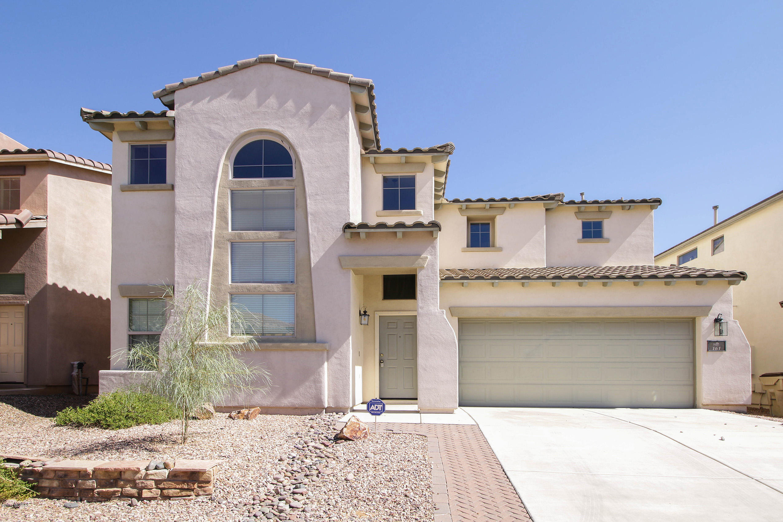 Beautiful 4 bedroom home with a bedroom and full bath conveniently located downstairs. Tasteful 18 in. tile in kitchen and bathrooms. Stainless steel appliances w/ gas stove and maple cabinets w/ crown molding and Corian counters in kitchen. 3 full baths w/ cultured marble surrounds, two tone paint, blinds on windows, surround sound prewire, cabinets in laundry, freezer circuit in garage, firepit and pavers in backyard. Landlord only allows 1 dog, No Cats.
