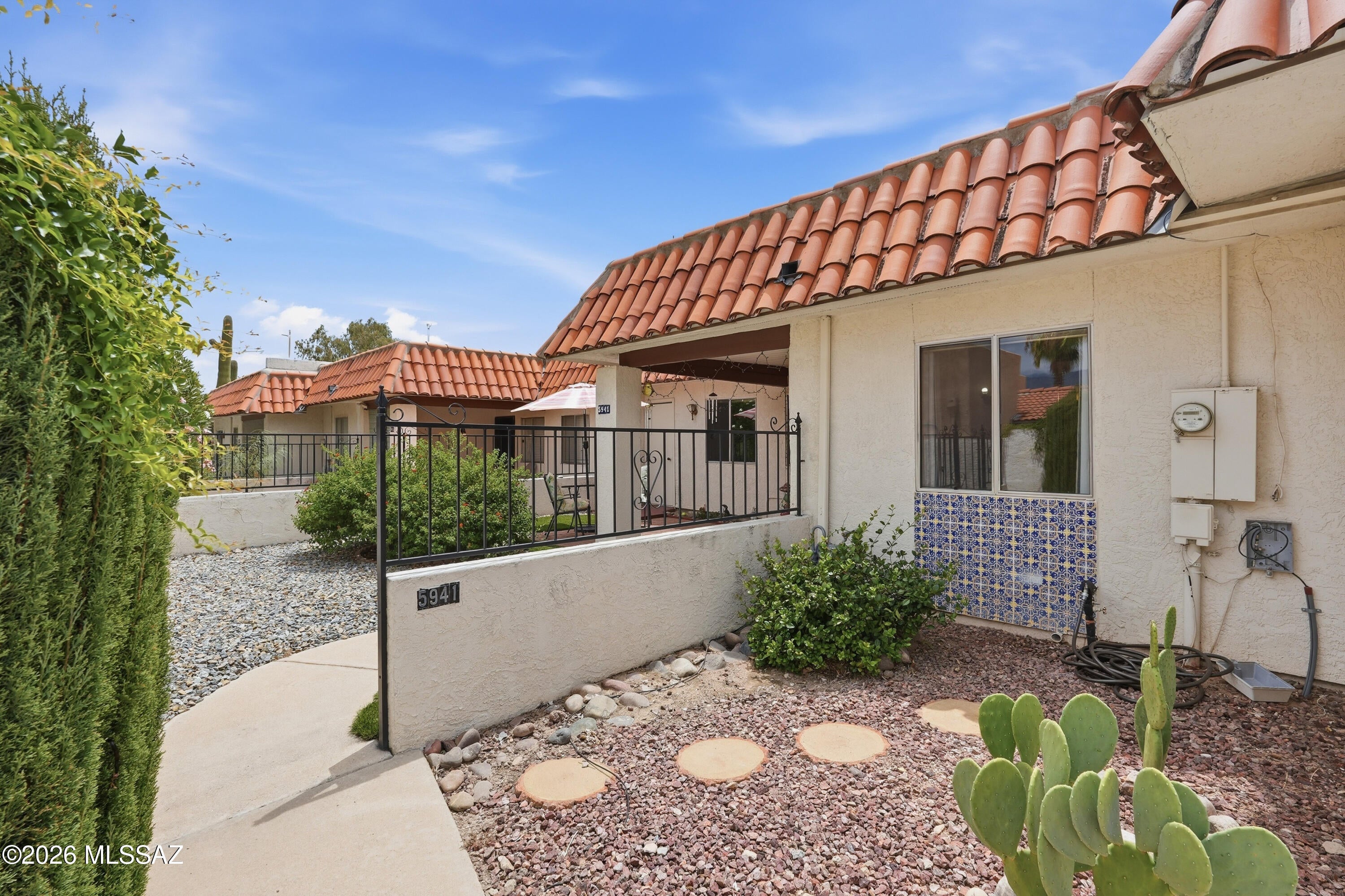 Enjoy the convenience of central Tucson from this 2-bedroom, 2-bath townhome, perfectly positioned close to everyday conveniences. Inside, the split-bedroom floor plan offers a comfortable layout with separation between the two bedrooms and baths. Step outside to a welcoming front yard with a covered patio, creating an inviting outdoor space to relax and enjoy. The location makes everyday errands easy, with Costco, Target, grocery stores, dining, shopping, and Tucson Medical Center all just minutes away. A charming little spot to call home, right in the heart of Tucson.