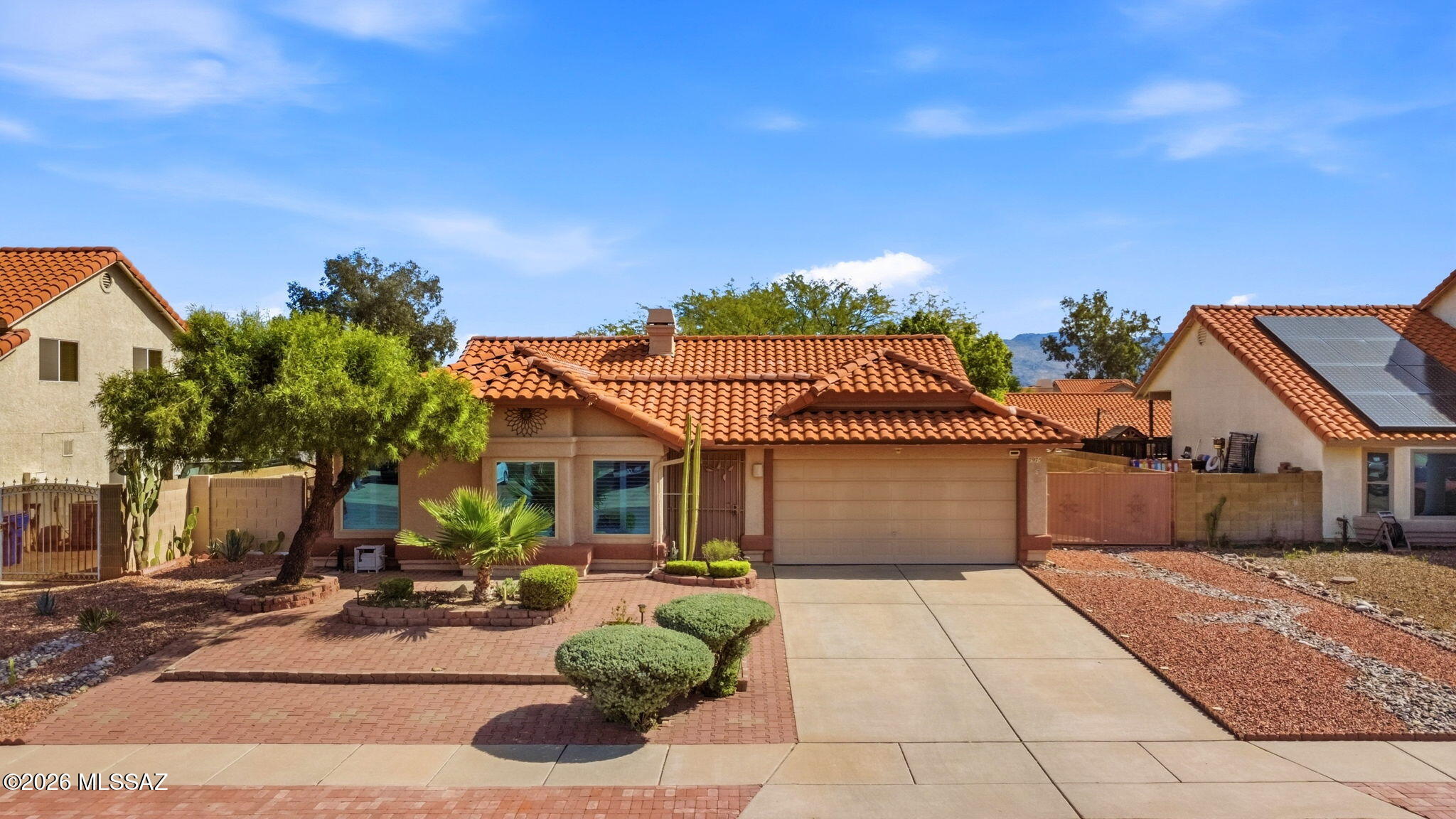 No HOA Rita Ranch 4-bedroom with major systems already done. This home offers 1,710 sq ft with a functional separate living room / family room layout and cozy fireplace. This split bedroom home offers recent major upgrades that include dual-pane windows (3-4 yrs) with plantation shutters, newer HVAC (3 yrs), and newer roof (4 yrs), providing peace of mind and energy efficiency. The home also features a 2-car garage, double gate for RV storage, and a covered rear patio--perfect for relaxing or entertaining. Situated on a spacious .18 acre lot with convenient access to shopping, dining, parks, freeway access, and Davis-Monthan AFB. This is truly a turnkey opportunity!
