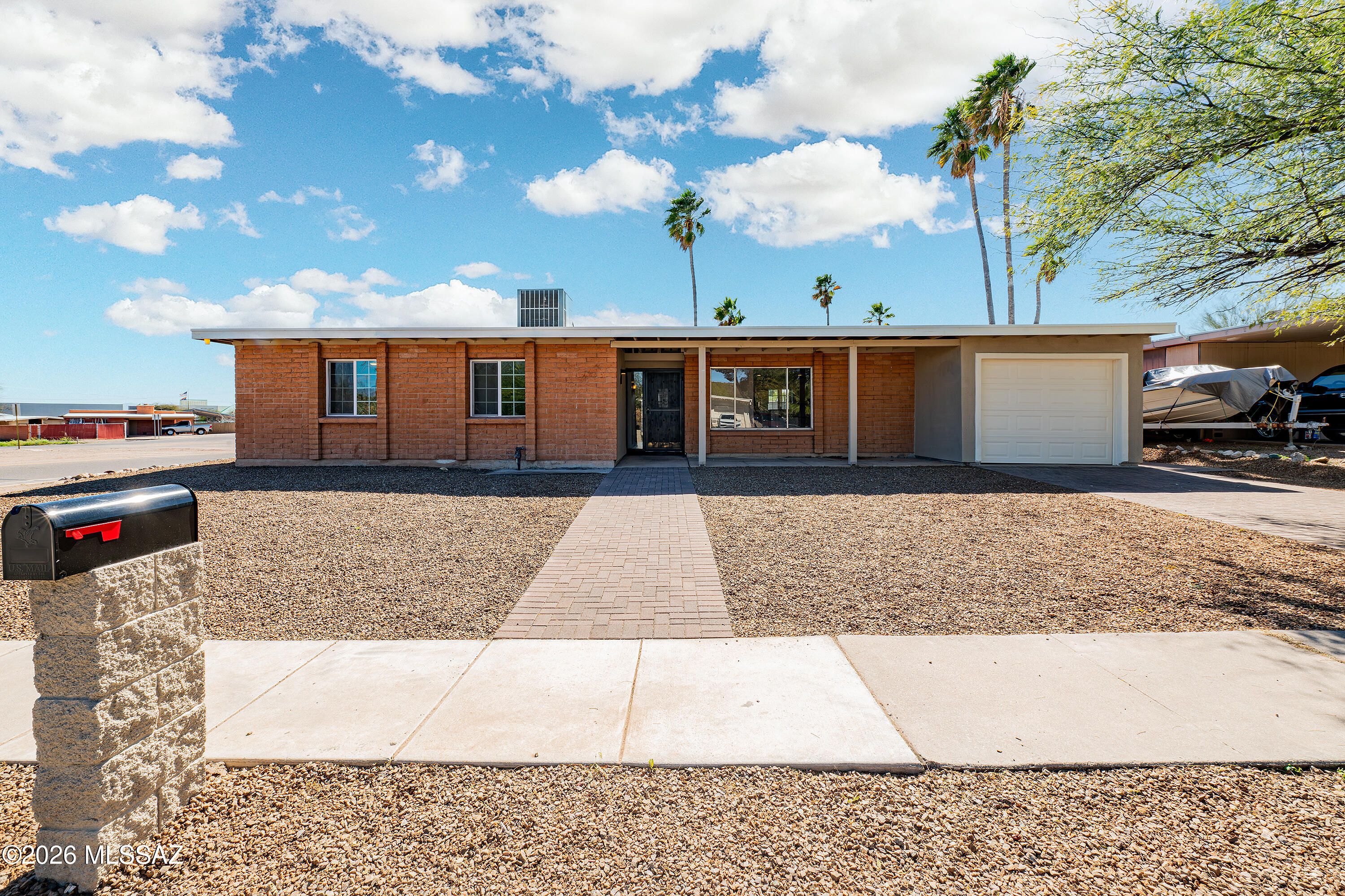 Welcome to this fully remodeled 4 bedroom/2 bath home!  The new paver driveway adds curb appeal, while the interior features all new flooring throughout, fresh paint and updated bathrooms with modern finishes. The open living space creates a warm and inviting area to host family and friends. The kitchen area provides plenty of cabinet space and new appliances. 
The backyard has been fully upgraded with artificial turf, pavers and a new block wall with gates, offering a private and low maintenance space. Enjoy the built-in fire pit and subtle mountain views perfect for relaxing or entertaining. 
Just minutes from shopping and restaurants.
