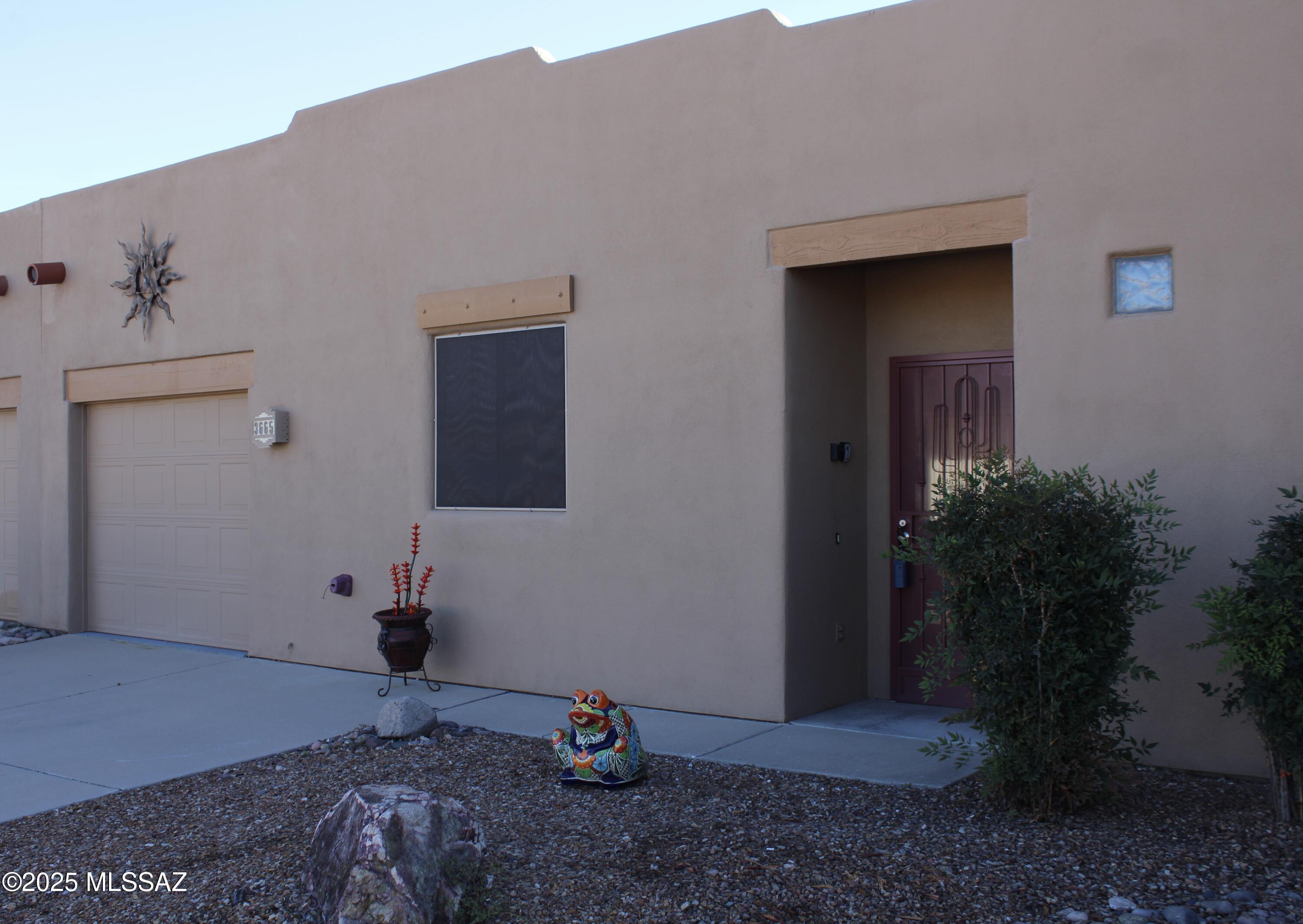 Welcome to this beautifully upgraded townhouse in The Springs, a 55+ community! This home features a newer HVAC system (2023), newer exterior paint, roof recoating, and a front security door. Inside, enjoy newer flooring in bedrooms and bathrooms, quartz countertops in the primary bath, upgraded kitchen counters with a new sink, and higher-profile toilets. The great room offers a new electric fireplace with color lighting options, plus sunshade screens on all windows. Residents can enjoy a scenic trail with a dog run area and stunning golf course and mountain views. Conveniently located near Torres Blanca Golf Course and Green Valley Recreation with pool, spa, fitness, and social amenities. Don't miss this move-in ready gem—make it yours today!